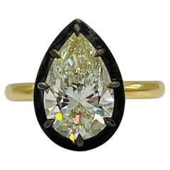 GIA White Diamond Pear Shape in Black Rhodium Bezel and 18K Yellow Gold