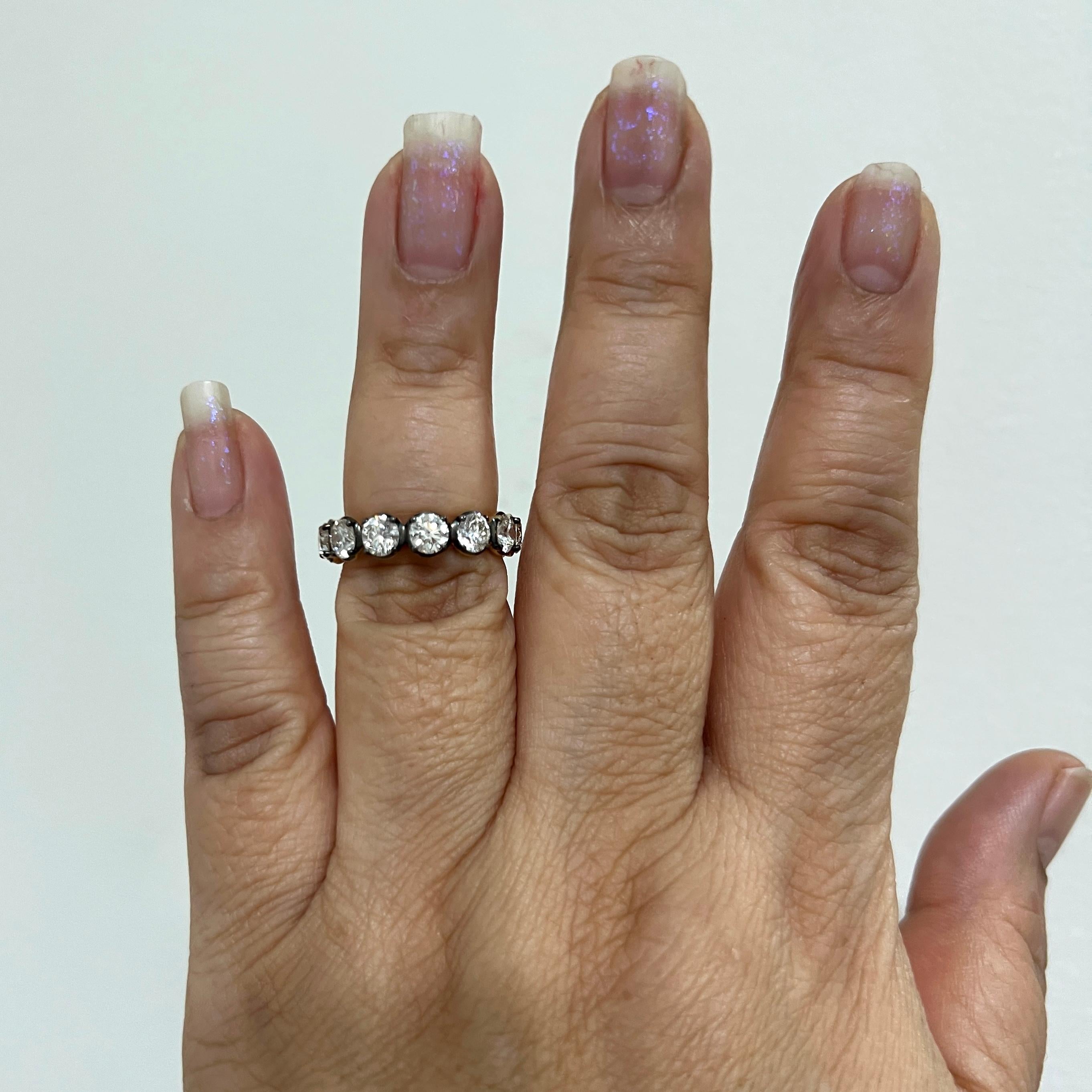 Gorgeous 4.01 ct. I-J VVS-SI white diamond rounds.  Total of 13 stones, each one is 0.30 ct. Handmade in 18k yellow gold and black rhodium.  Ring size 6.5.  Each stone comes with a GIA certificate.