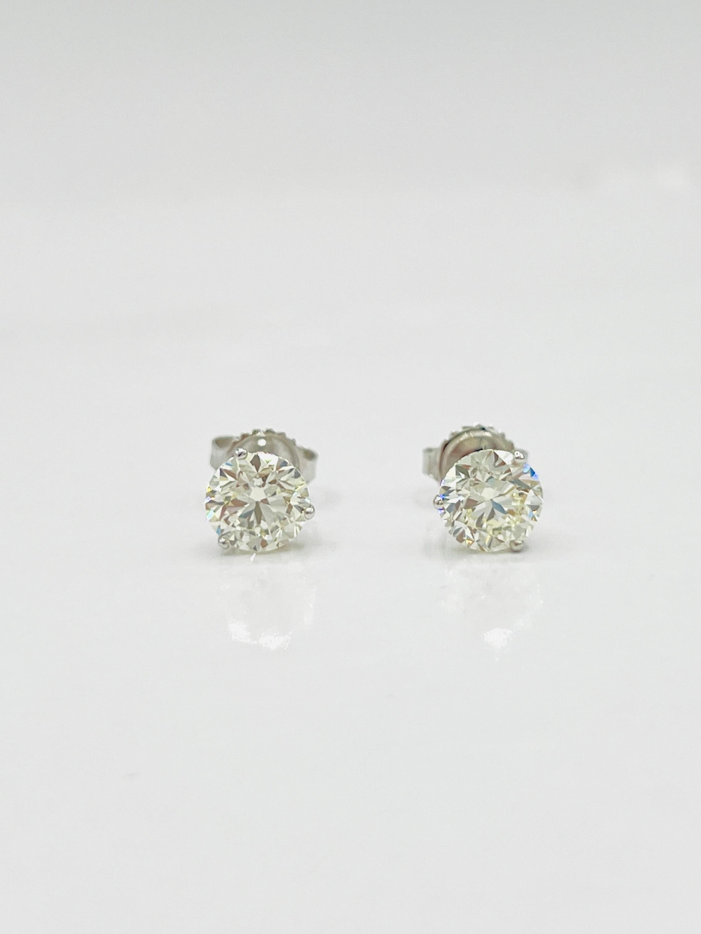 GIA White Diamond Round Stud Earrings in 18K White Gold 1