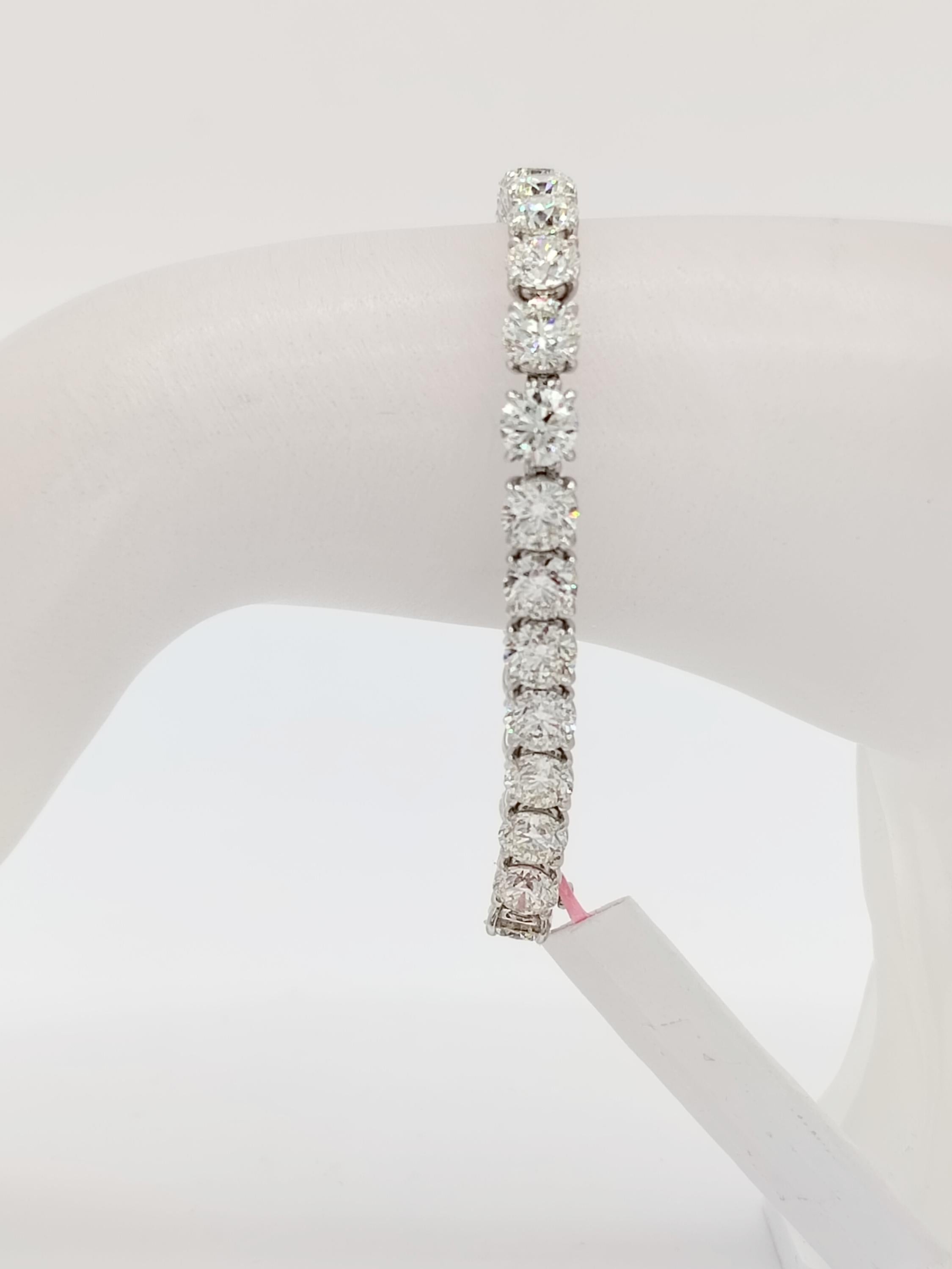 Gorgeous 18.11 ct.  HIJ  VS-SI white diamond rounds.  Each stone is 0.60 ct.  Handmade in 18k white gold.  Length is 6.75
