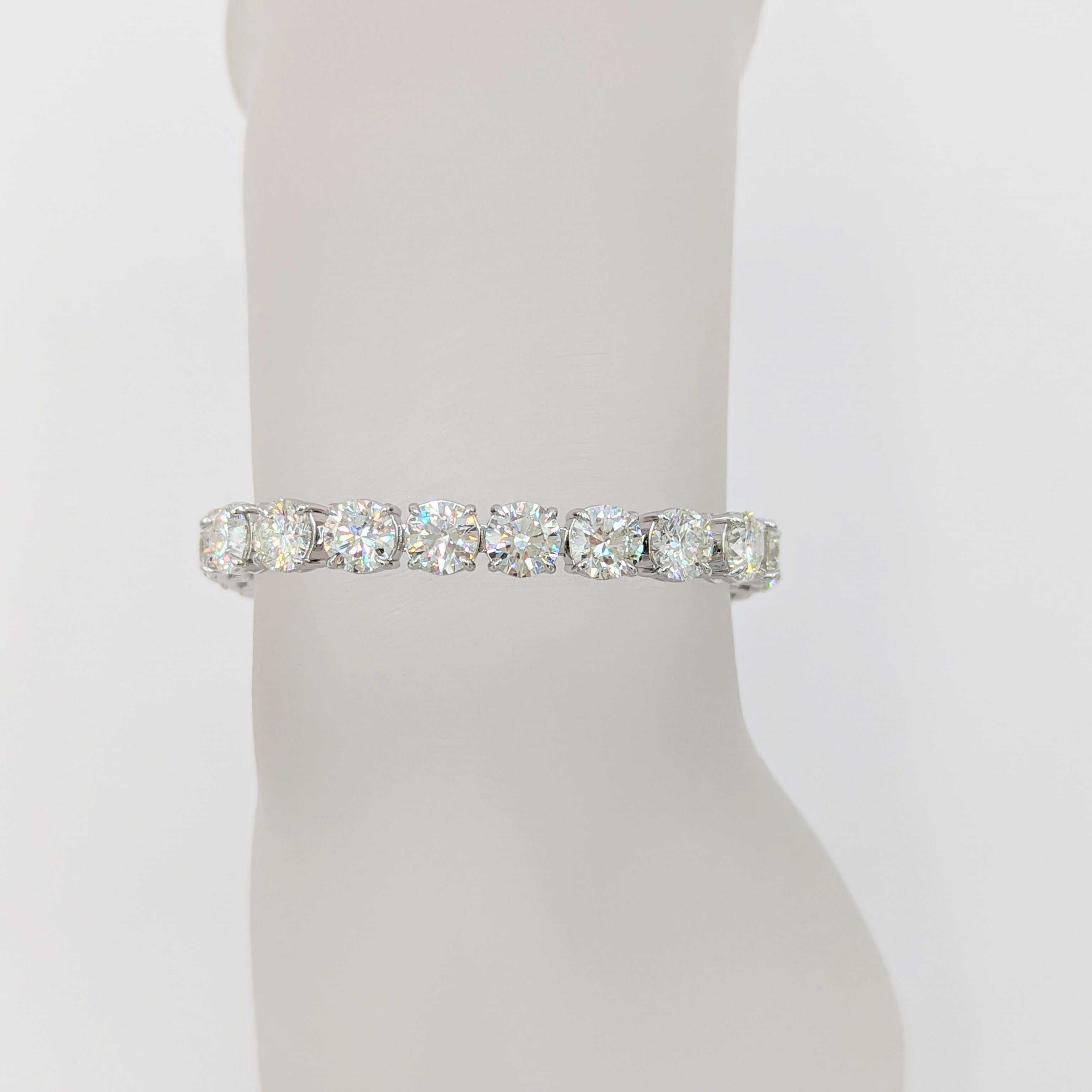 Gorgeous 26.04 ct. white diamond round tennis bracelet with 26 diamonds that are I-J color and SI1-SI2 clarity.  Handmade in platinum.  Length is 7