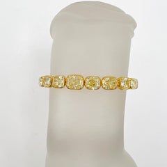 GIA Yellow Diamond Cushion Graduated Tennis Bracelet in 18K Gold
