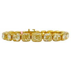 GIA Yellow Diamond Cushion Graduated Tennis Bracelet in 18K Gold
