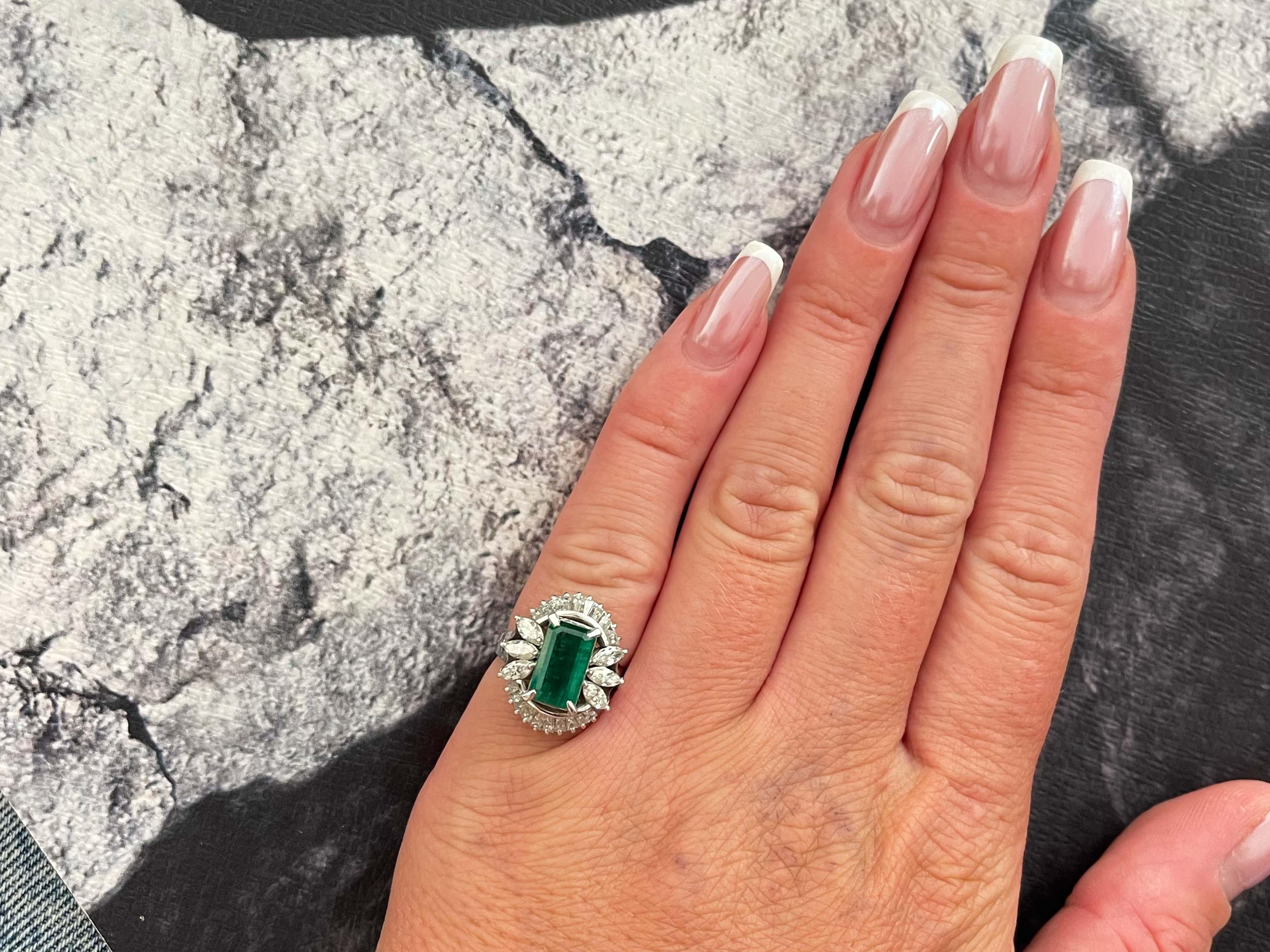 Ring Specifications:

Metal: Platinum

Ring Size: 4.5 (Free Resizing Available)

Center Gemstone Specifications:

Gemstone GIA Report #: 5234037990

Species: Natural Beryl

Variety: Emerald

Geographic Origin: Zambia

Gemstone: Emerald

Gemstone