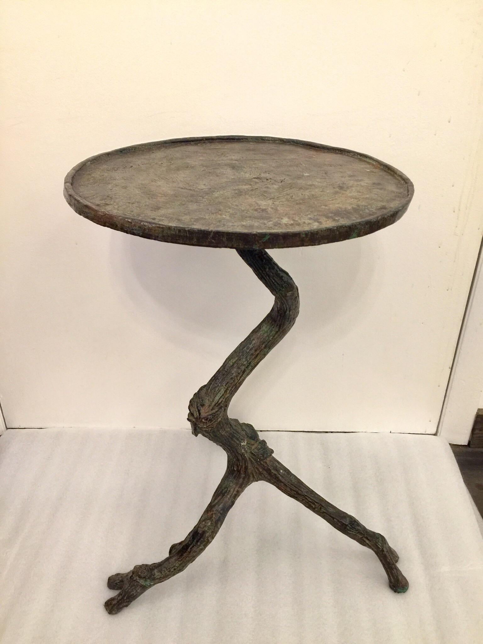 Extremely well crafted, this heavily made iron faux bois style table with lots of details. Painted patina showing green and black tones (see detailed images). No marking is visible upon inspection.