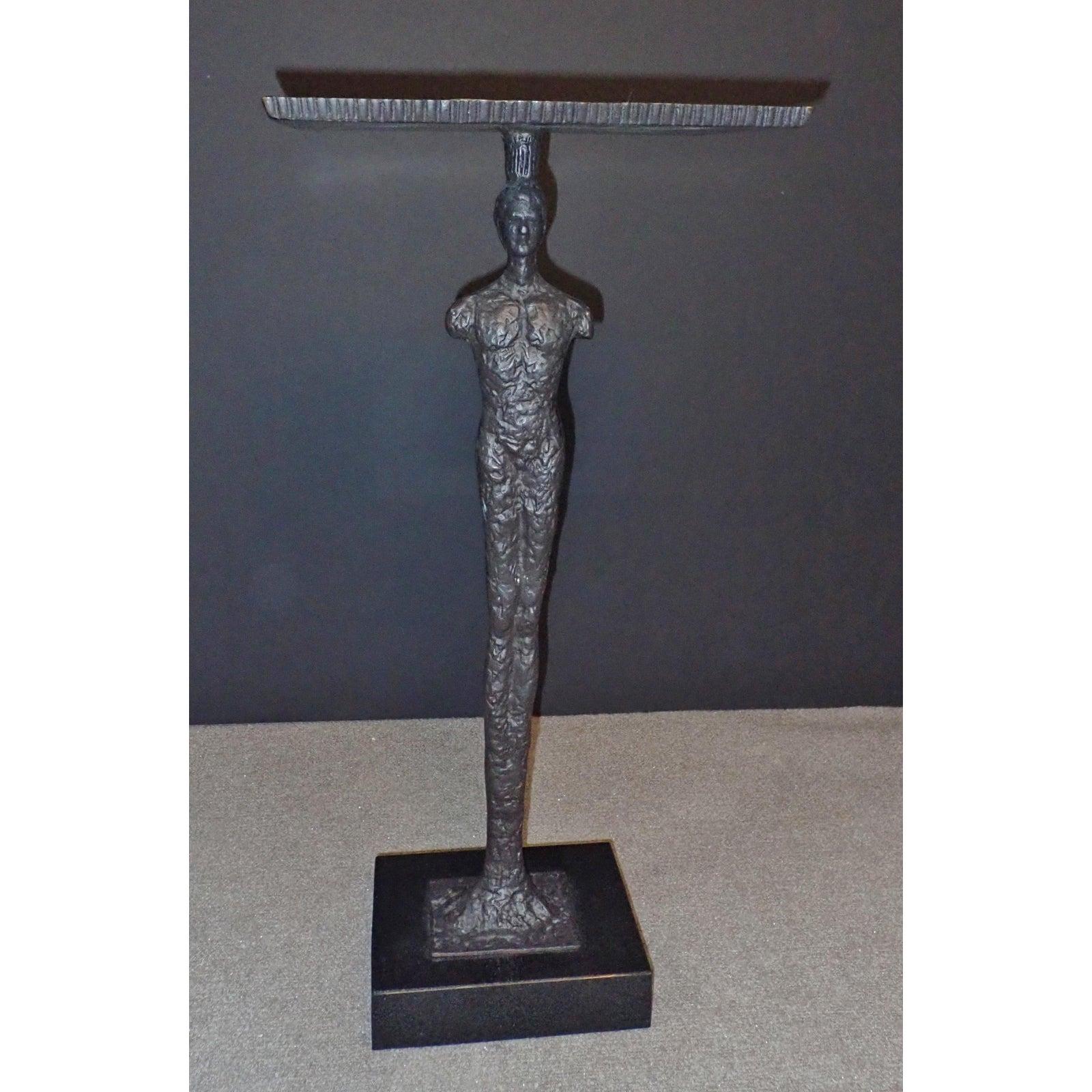 Giacometti style bronze figurative side table. Side table guéridon in the manor of Giacometti. Bronze mounted on granite or marble base.