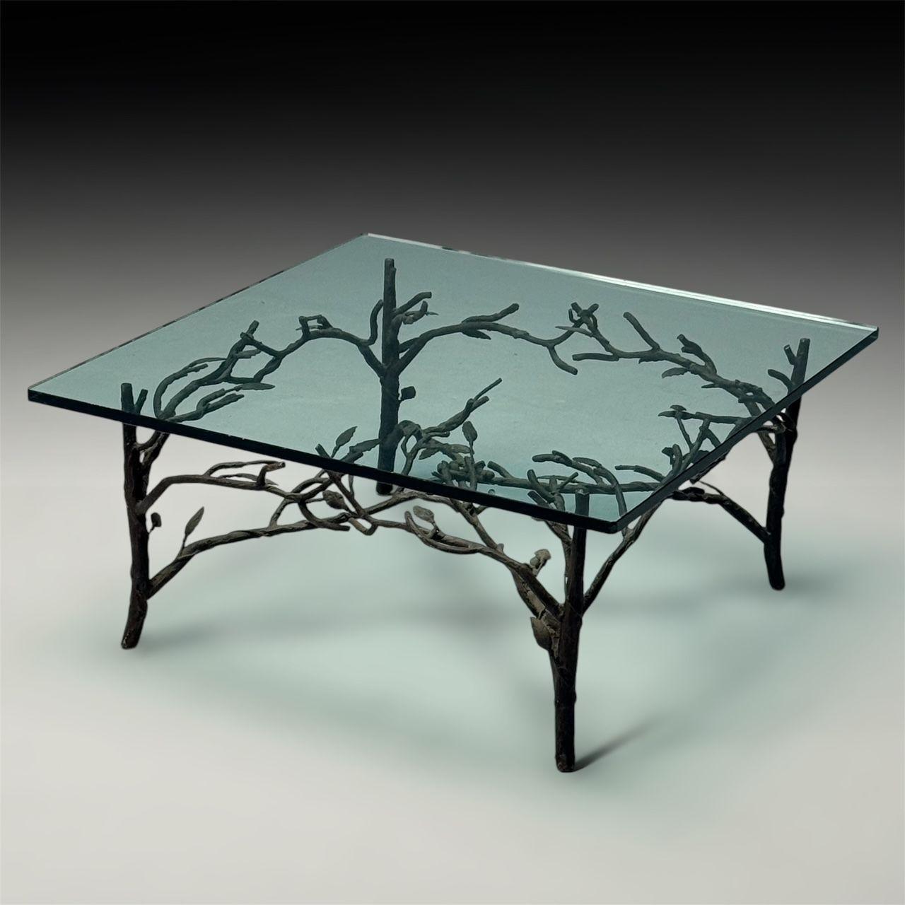 Giacometti Style, Mid-Century Modern, Square Coffee Table, Nature Motif, Metal

This square coffee table features a beautifully patinated metal base, inspired by the distinctive style of Giacometti. Produced in the second half of the 20th century,