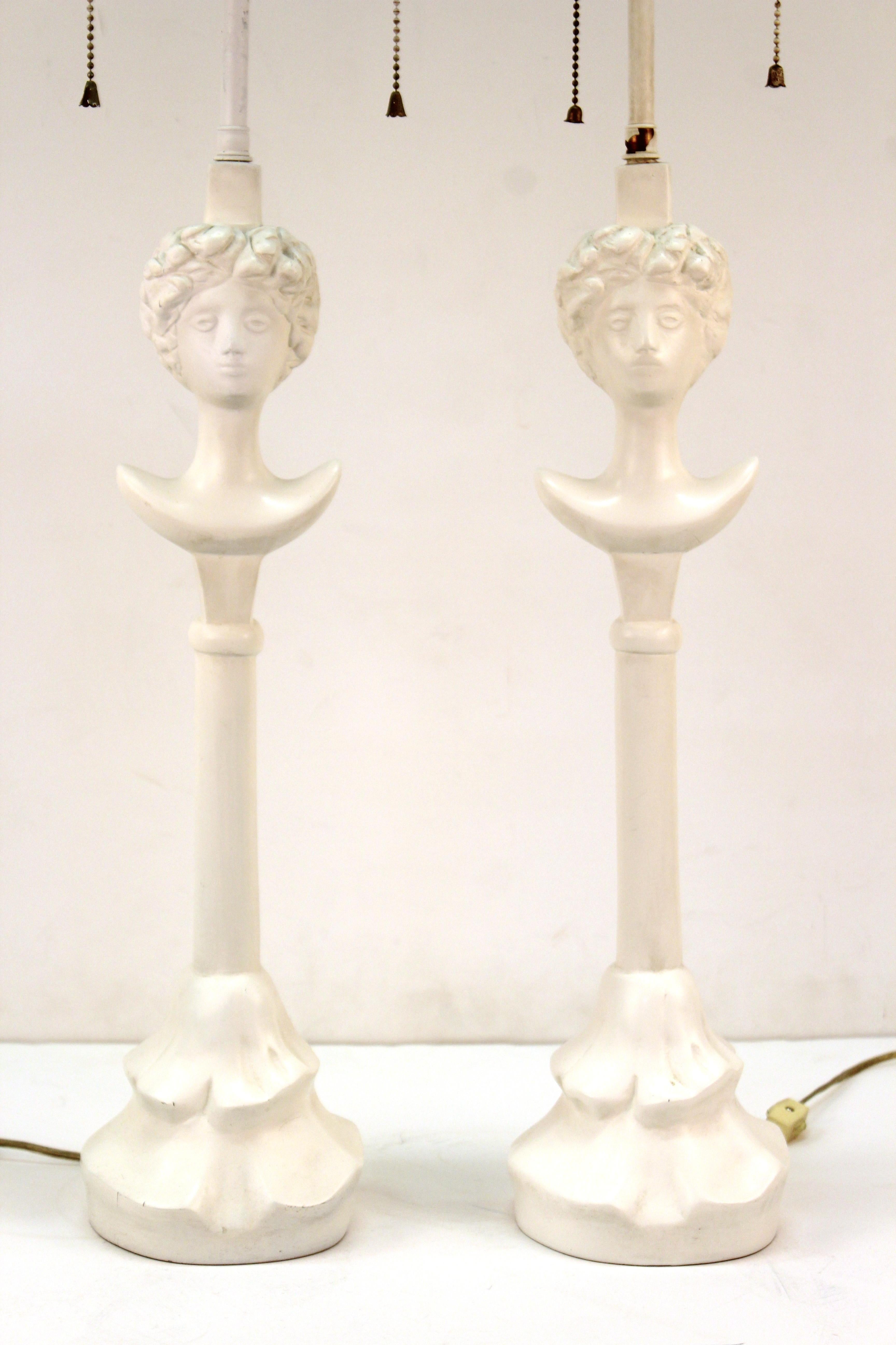 Pair of modern 'Tete de Femme' table lamps in the style of Diego Giacometti. The pair is made of white painted plaster over metal. In great vintage condition with age-appropriate wear and use.