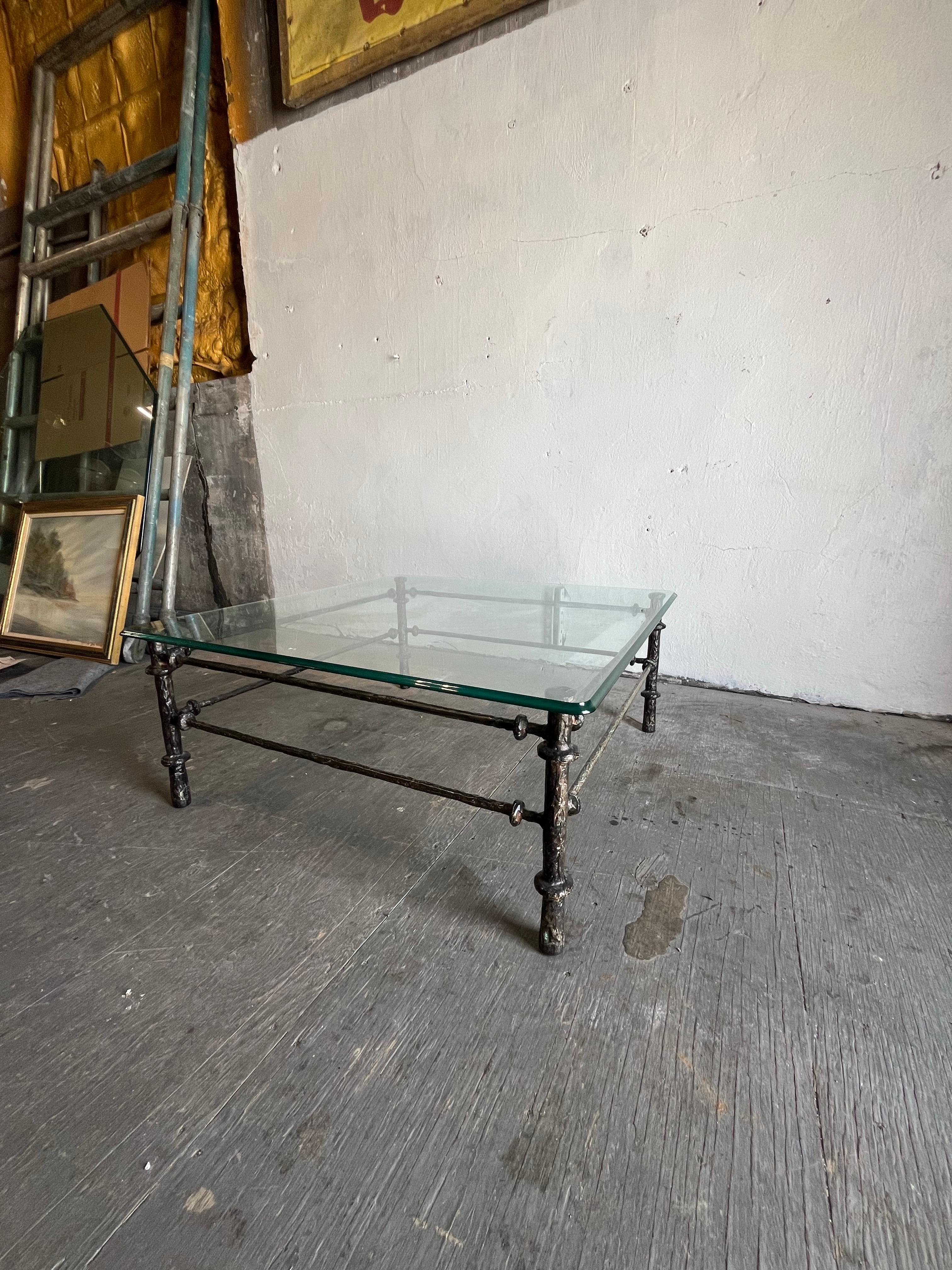 Beautiful and classic Giacometti style patinated bronze finish coffee table
Ogee Beveled glass. 
Curbside to NYC/Philly $450