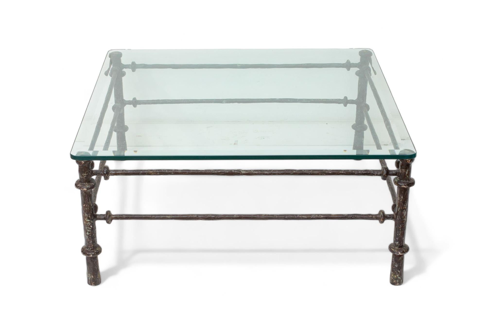 Giacometti style patinated bronze finish square coffee table
Original patina, with warm bronze finish
Beveled glass
Excellent vintage condition
Available to view in situ in our Miami gallery
