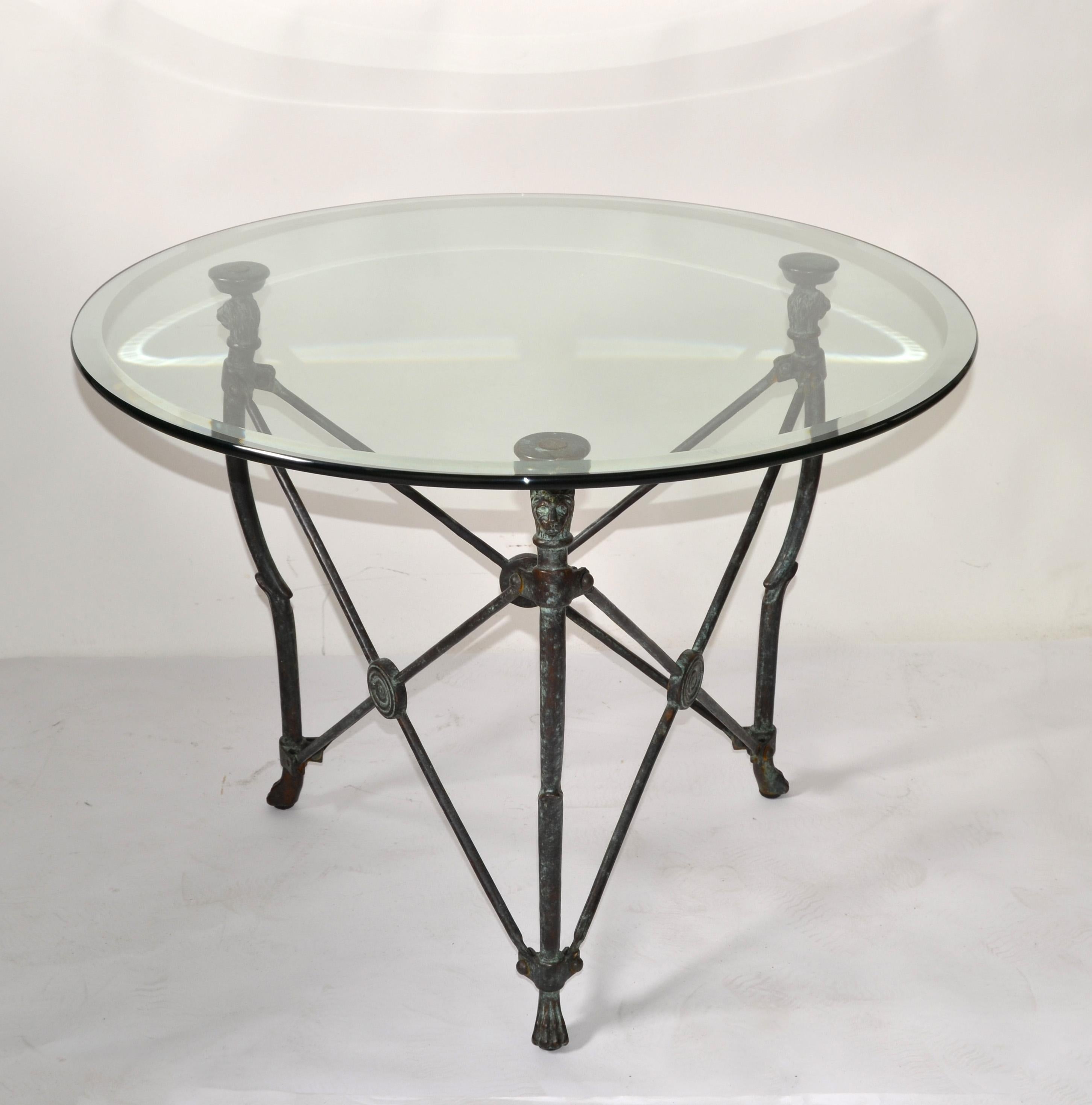 Italian round Neoclassical solid Bronze Accent, End or Side Table designed in the manner of Diego Giacometti and made in Italy the late 20th Century. 
This beautiful Accent table is supported by three decorated bronze legs that have bronze lion