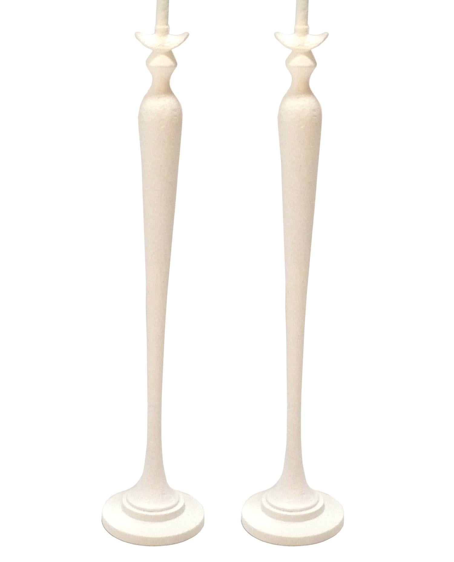 Pair of sculptural floor lamps, in the manner of Diego Giacometti, called the Firenze Model, by Baker Furniture, American, circa 2000s. They are constructed of a faux plaster and are a nice quality, like all Baker products. They had an original