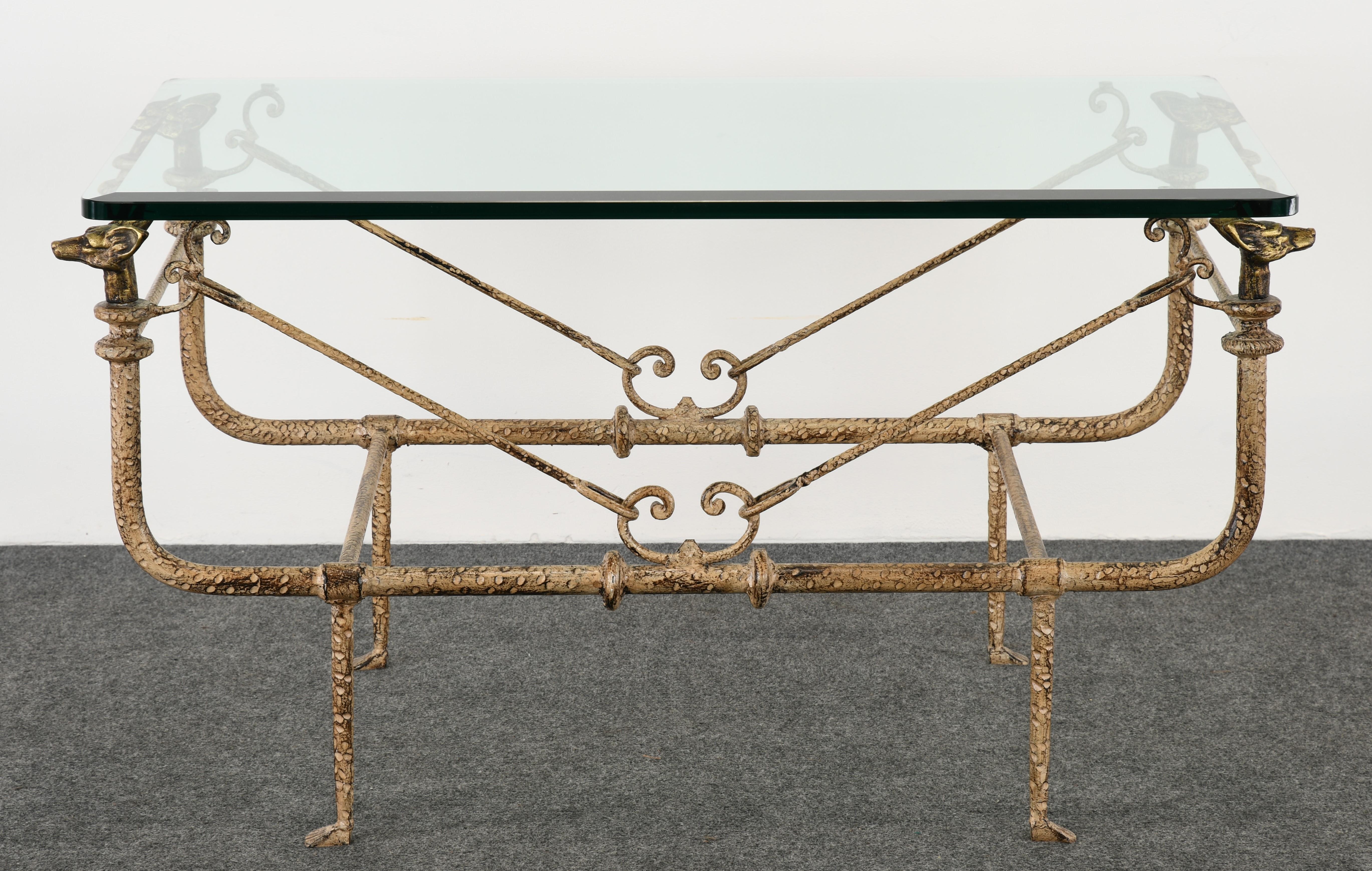 An impressive Giacometti Style Wrought Iron and Bronze Coffee Table by Paul Ferrante. This beautiful distressed painted table has a 3/4