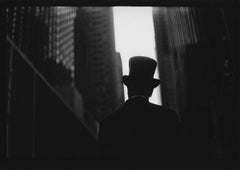 Untitled #21 (Man's Hat and Skyscrapers) from New York - Black and White Photo