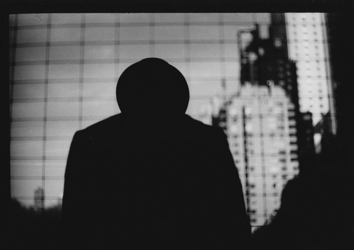 Giacomo Brunelli Black and White Photograph - Untitled #25 (Man Columbus Circle) - New York, Black & White, Silhouette, Drama
