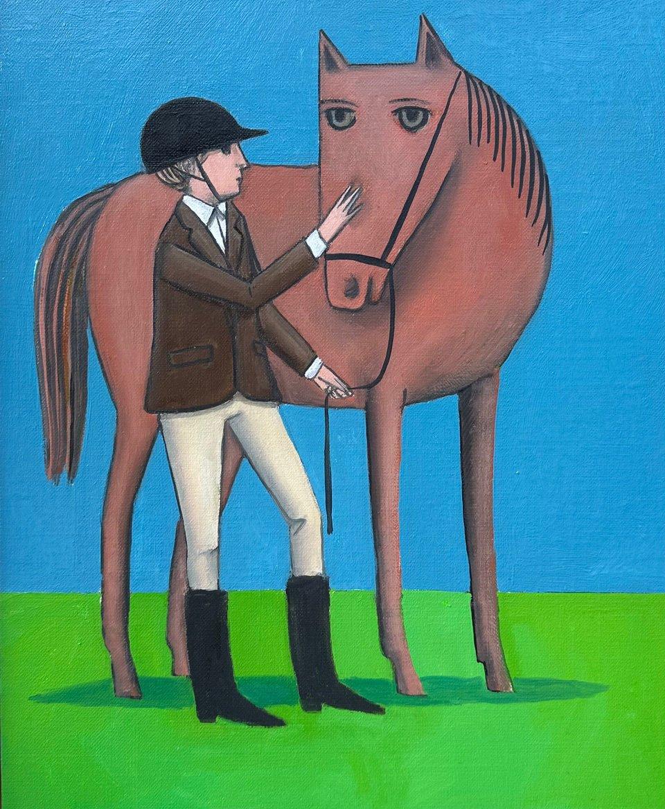 Chica de pie junto a un caballo