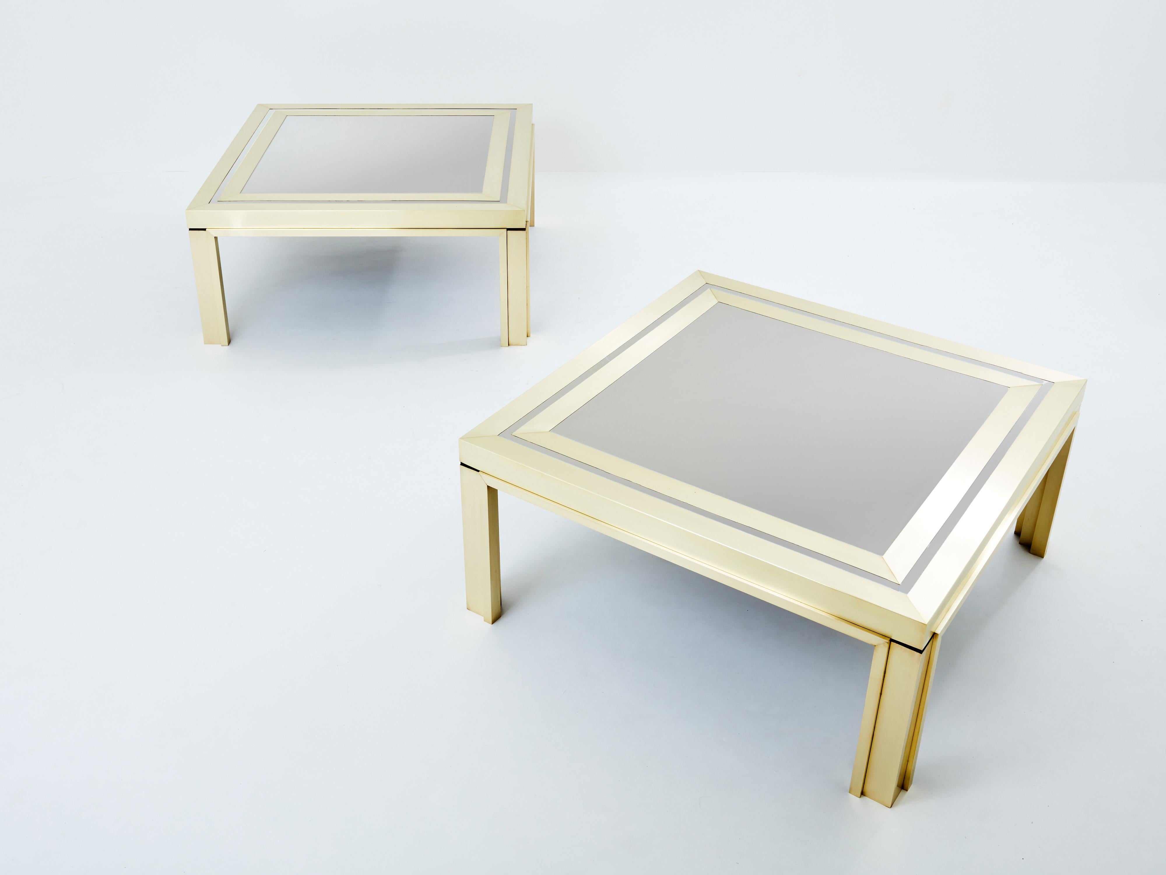 Simple lines and strong presence point to this pair of Italian coffee tables. Designed by Giacomo Sinopoli and produced by Liwan’s Rome in the late 1970s, they feature a massive brushed brass structure, with stainless steel tops. Its symmetry and