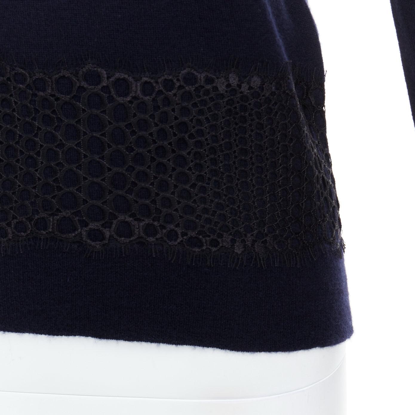 GIAMBATTISTA VALLI 100% cashmere navy black mix lace sweater  IT38 XXS
Reference: LNKO/A02456
Brand: Giambattista Valli
Material: 100% Cashmere
Color: Navy, Black
Pattern: Lace
Closure: Pullover
Extra Details: Lace insert have no elasticity.
Made