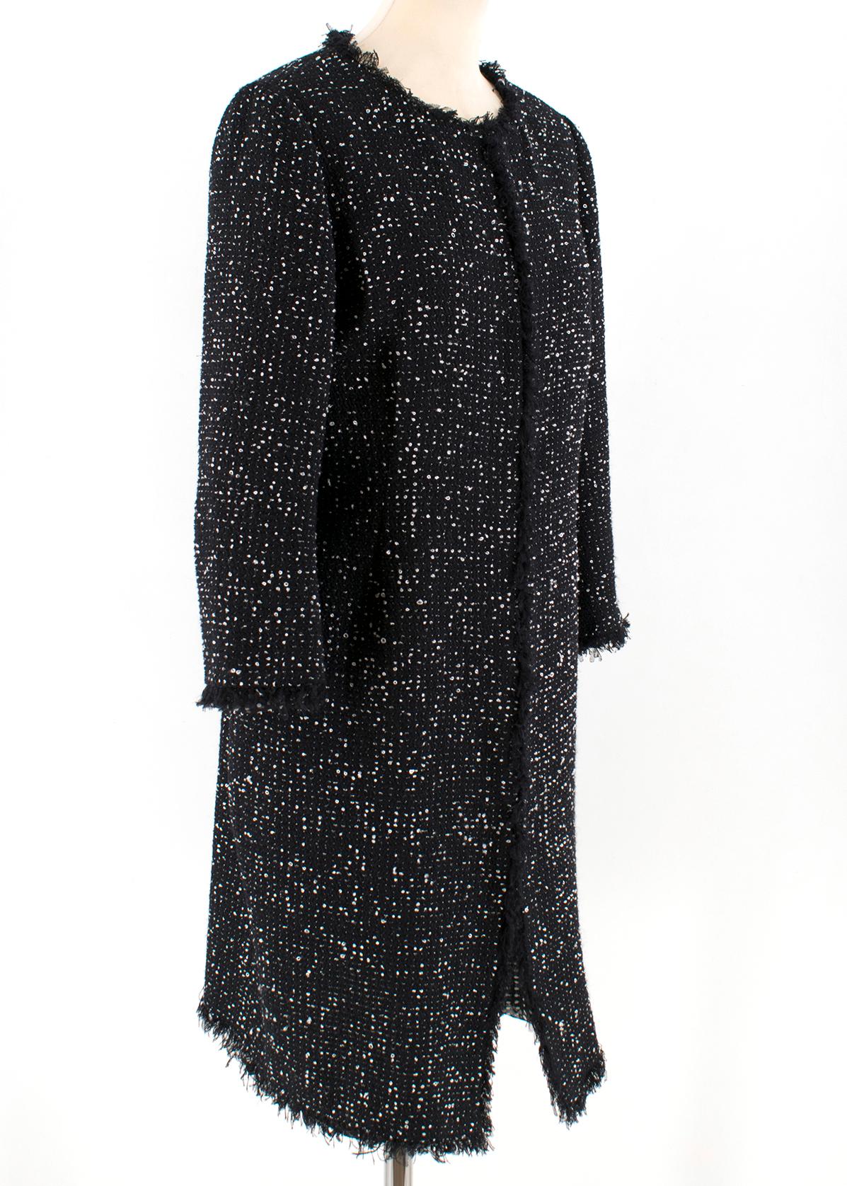 Giambattista Valli Black Boucle Tweed Jacket

- Open-Front Duster
- Black and white tweed
- A self fringe trim 
- Fully lined in silk chiffon
- V-neckline
- Long sleeves
- Hook-and-eye closure

Please note, these items are pre-owned and may show