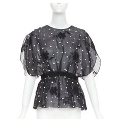 Blusa con volantes de encaje transparente y apliques de lunares negros de Giambattista Valli, talla 42 M