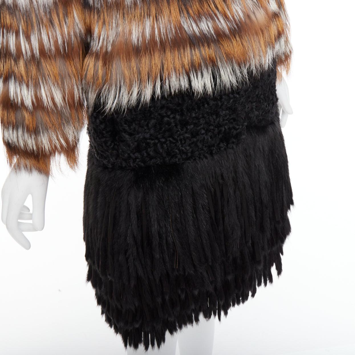 GIAMBATTISTA VALLI brown black mixed fur fringe hem long coat
Reference: NKLL/A00430
Brand: Giambattista Valli
Collection: 2012 Pre Fall - Runway
Material: Fur
Color: Brown, Black
Pattern: Striped
Closure: Snap Buttons
Lining: Black Fabric
Made in: