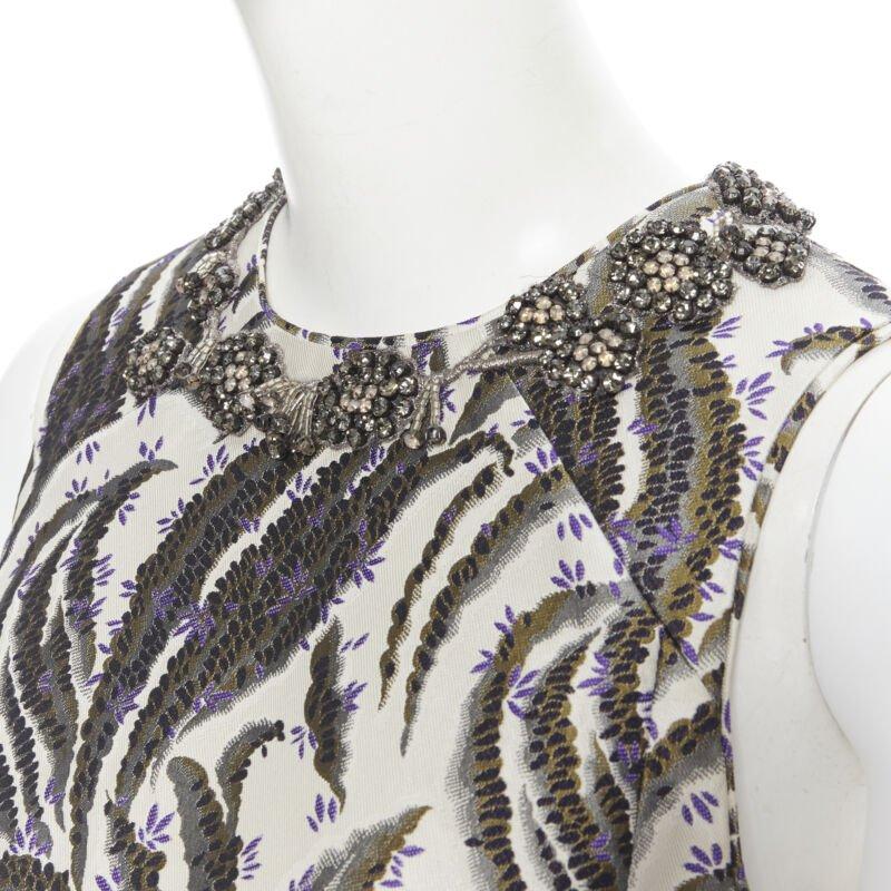IAMBATTISTA VALLI floral purple blossom jacquard crystal collar sheath dress XS
Reference: LNKO/A01686
Brand: Giambattista Valli
Designer: Giambattista Valli
Collection: 2016
Material: Polyester
Color: Beige, Purple
Pattern: Floral
Closure: