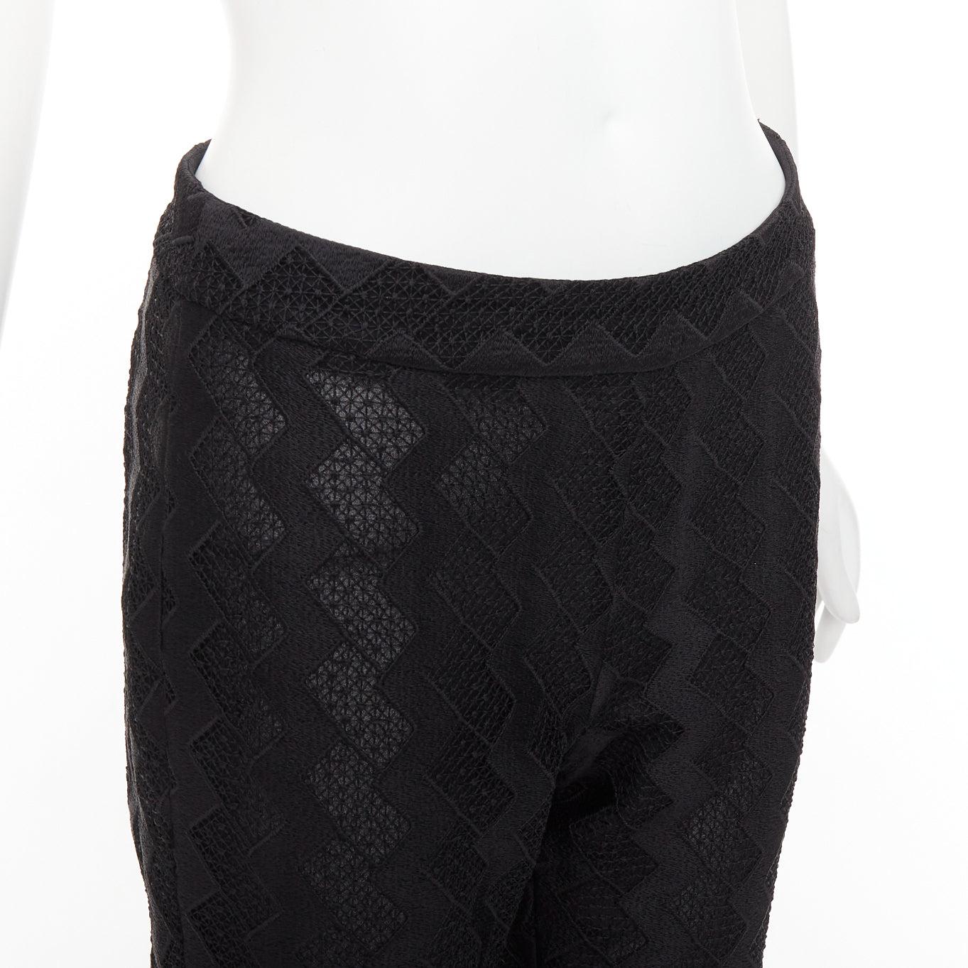 GIAMBATTISTA VALLI GIAMBA black zigzag lace lined flare pants IT40 XS
Reference: MECG/A00140
Brand: Giambattista Valli
Collection: Giamba
Material: Polyester
Color: Black
Pattern: Lace
Closure: Zip
Extra Details: Side zip.
Made in: