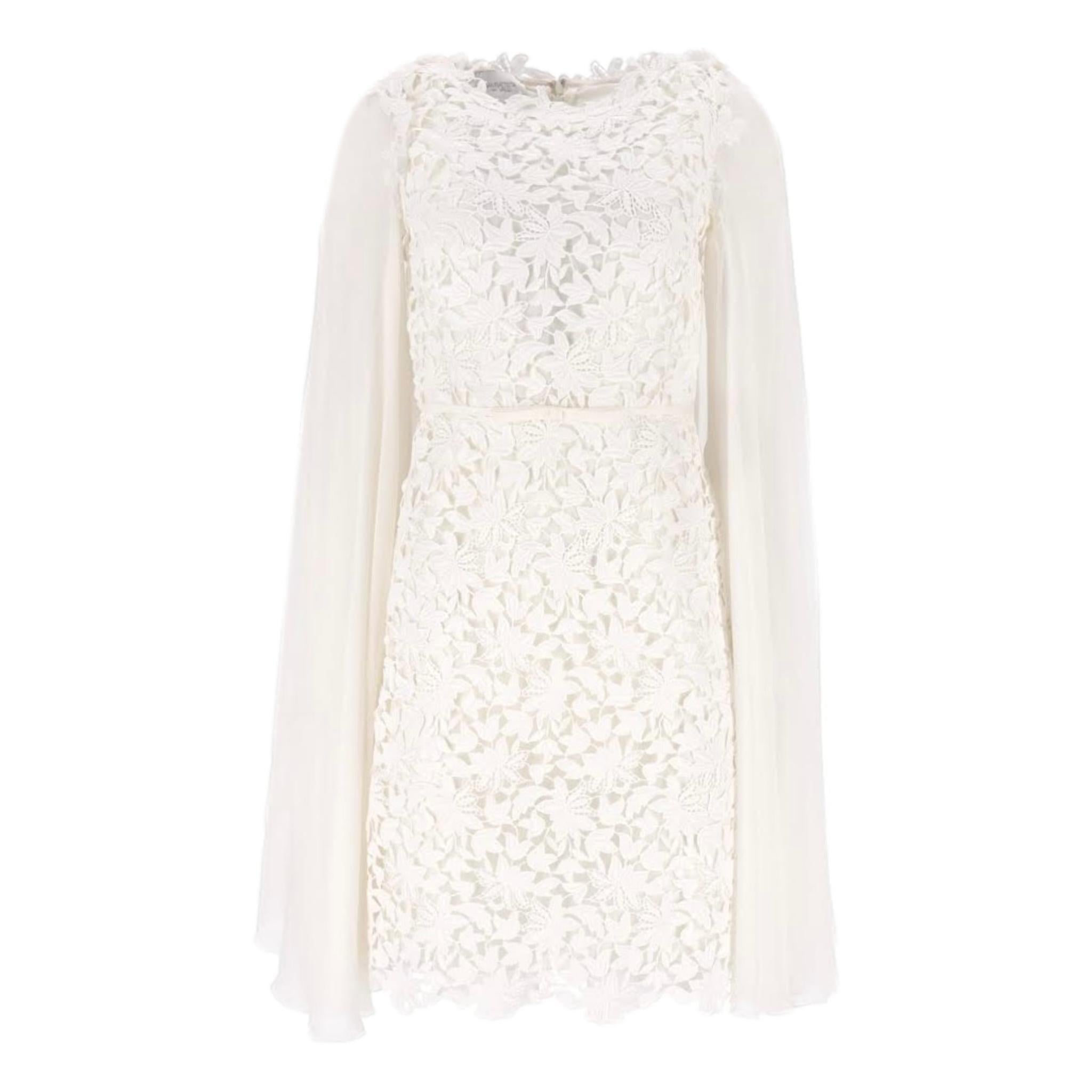Giambattista Valli Guipure Lace Cape Dress

Ivory lace dress with ribbon bow trim waist and chiffon sheer cape.

Rrp £2,499

Size - 38IT

Condition - Very Good

Composition - 86% Cotton, 14% Polyester, 100% Silk 