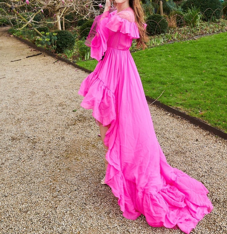 Giambattista Valli Hot Pink Silk Ruffled Gown With Lace Shoulders And Black Bow Giambattista Valli Hot Pink Silk Ruffled Gown With Lace Shoulders And Black Bow