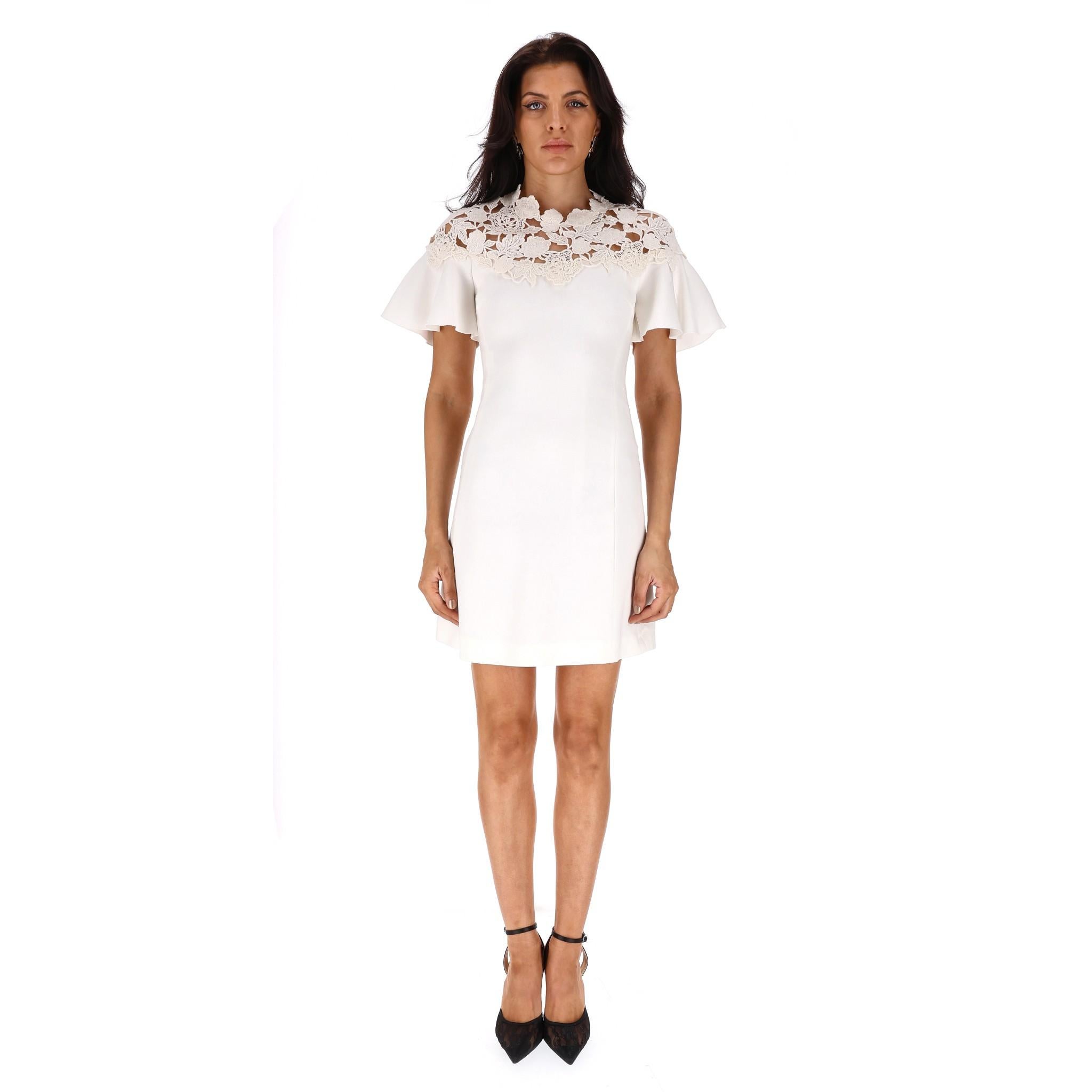 Giambattista Valli Lace Detailed Dress

White mini dress embellished with floral lace detailing to the neckline.

Flared short sleeves and A-line silhouette. Rrp Approx. £1,500

Size – 38IT

Condition – Very Good

Composition – 45% Cotton, 39%