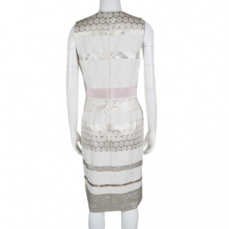 Step into timeless elegance with this designer dress. Meticulously crafted, it embodies grace and sophistication, making it the perfect choice for those seeking an exquisite wardrobe addition.