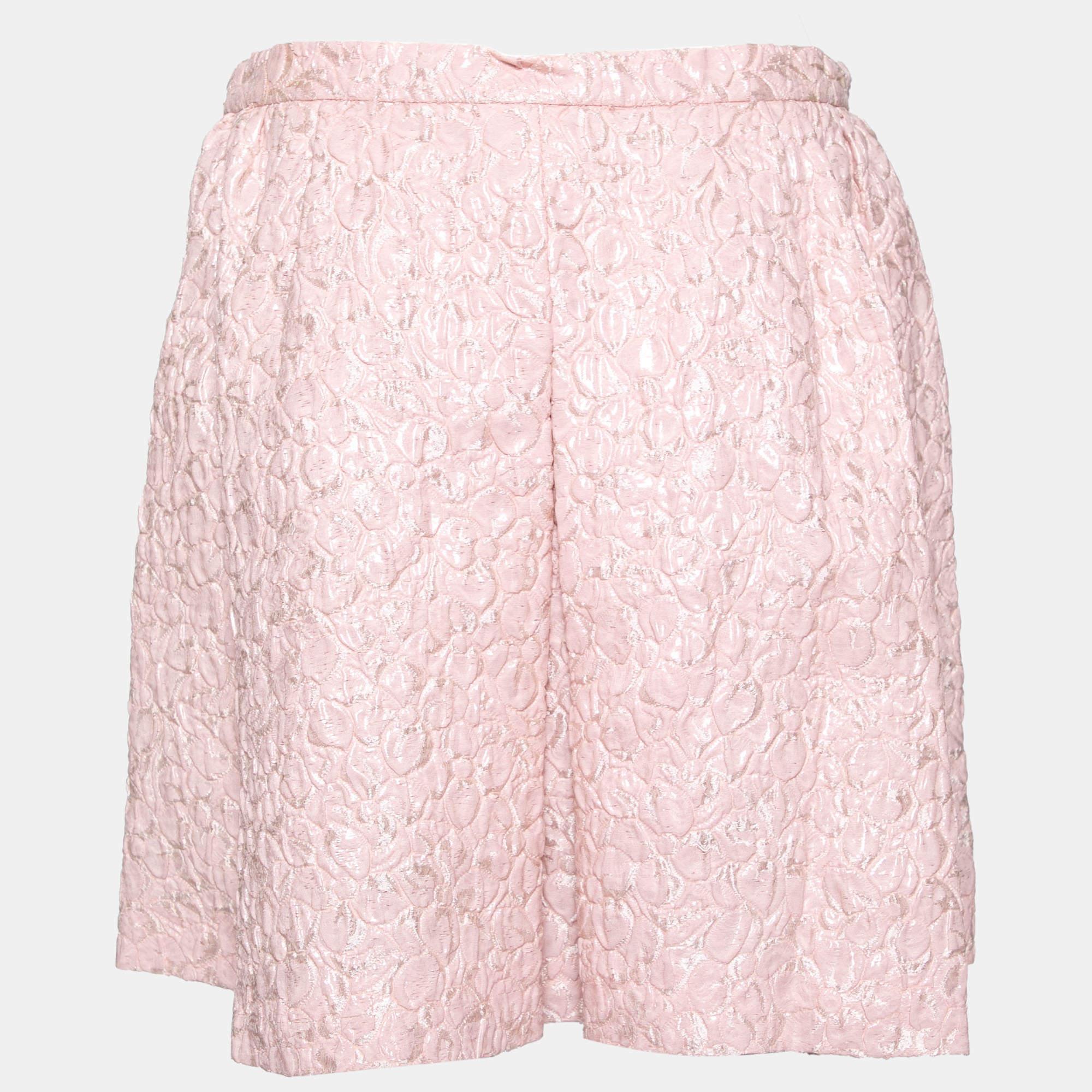 This elegant skirt is worth adding to your closet Crafted from fine materials it is exquisitely designed into a flattering shape.