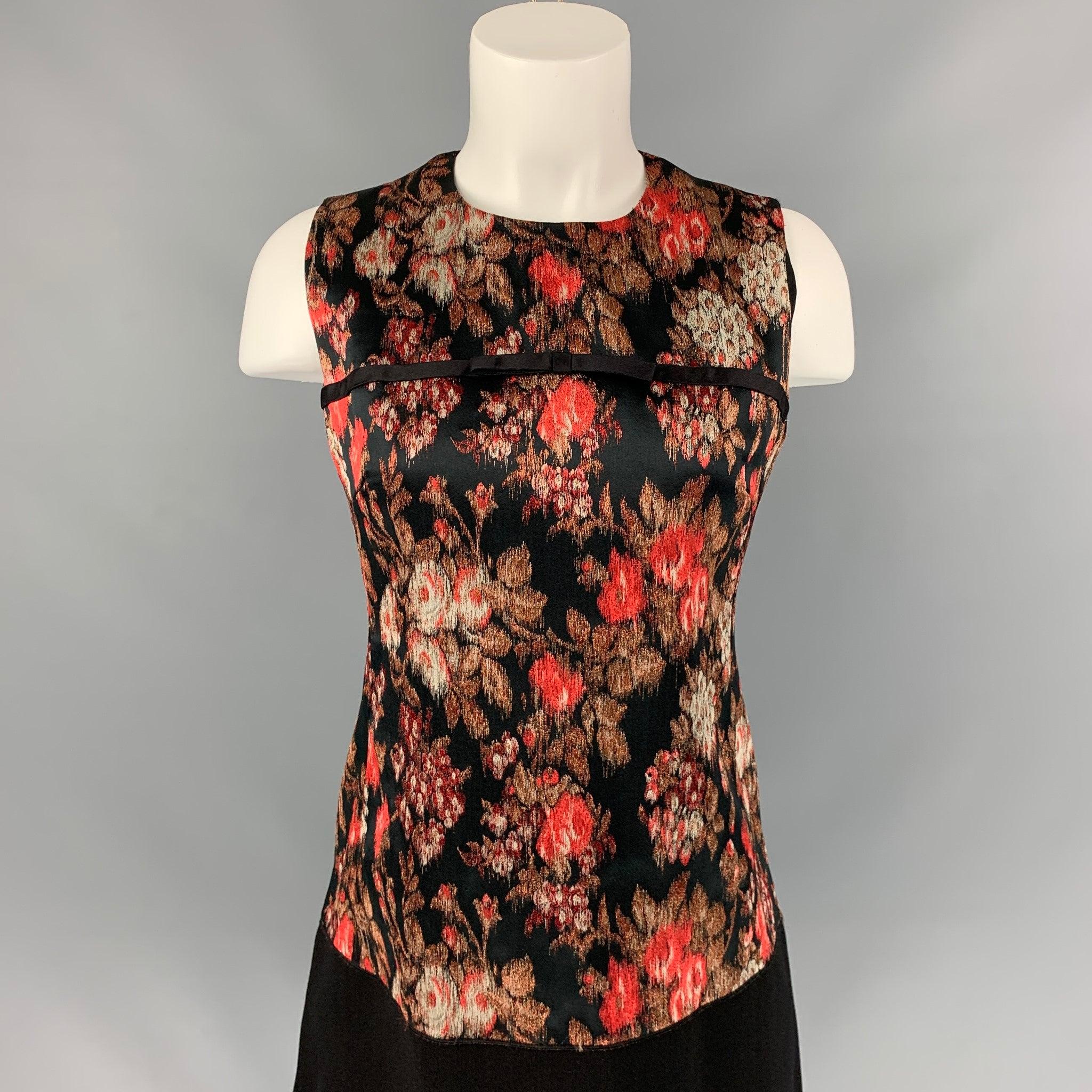 GIAMBATTISTA VALLI dress comes in a black & coral jacquard polyester blend with a slip liner featuring a shift style, bow detail, and a back zipper closure. Made in Italy.
Very Good
Pre-Owned Condition. 

Marked:   42/S 

Measurements: 
 
Shoulder: