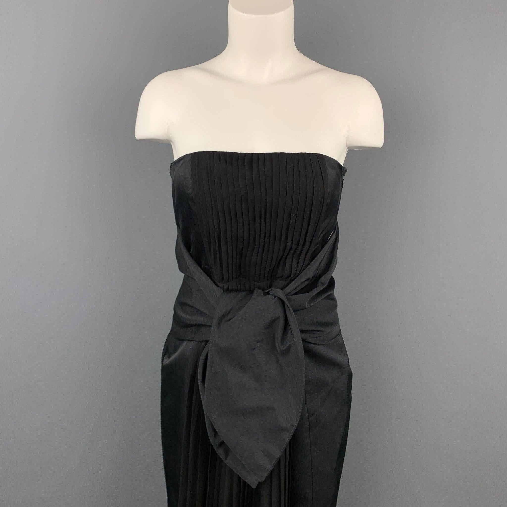 GIAMBATTISTA VALLI strapless dress comes in a black pleated cotton / silk featuring a cocktail style, inner bustier, wide waist tie detail, and a side zip up closure. Made in Italy.Very Good
Pre-Owned Condition. 

Marked:  42 / S 

Measurements: 
