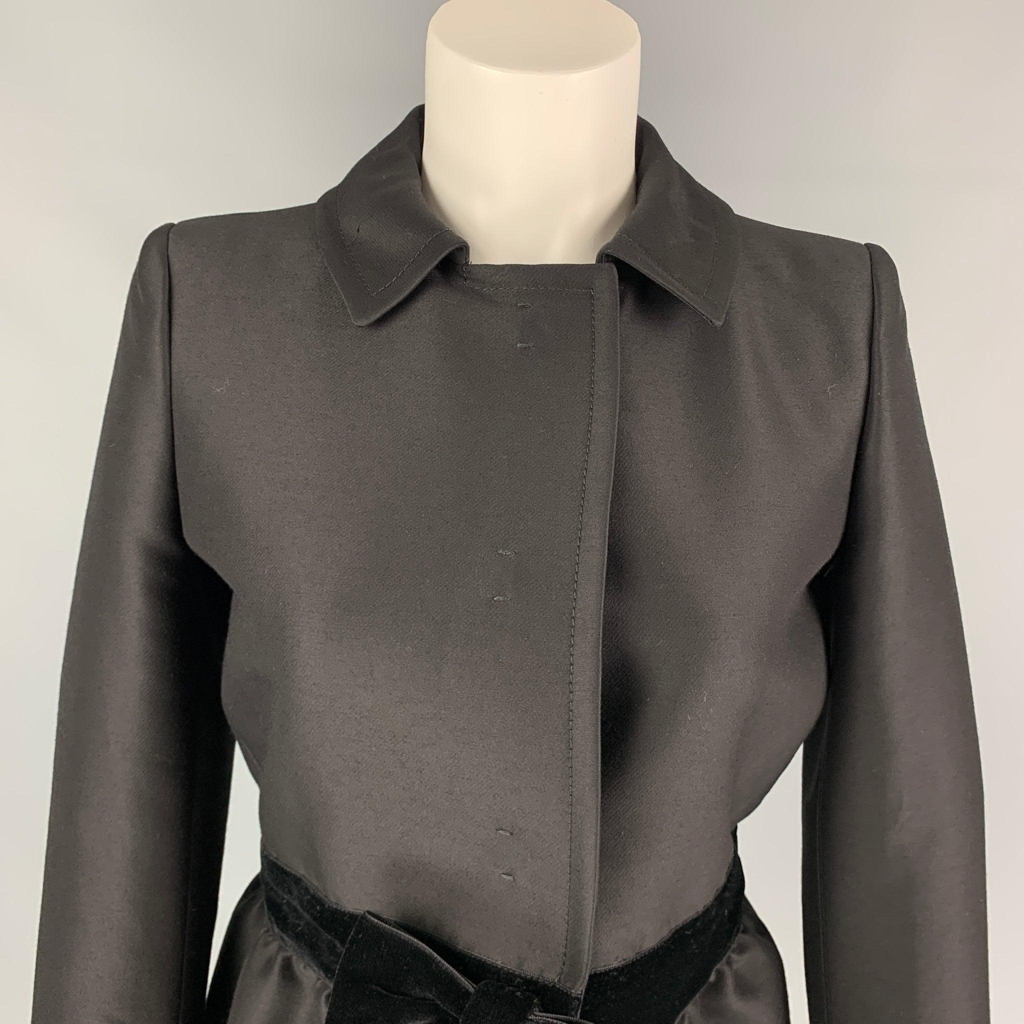 GIAMBATTISTA VALLI jacket comes in a black wool / silk with a full liner featuring a velvet bow detail, spread collar, and a hidden snap button closure. Made in Italy.New With Tags.  

Marked:   42 

Measurements: 
 
Shoulder: 14.5 inches  Bust: 36