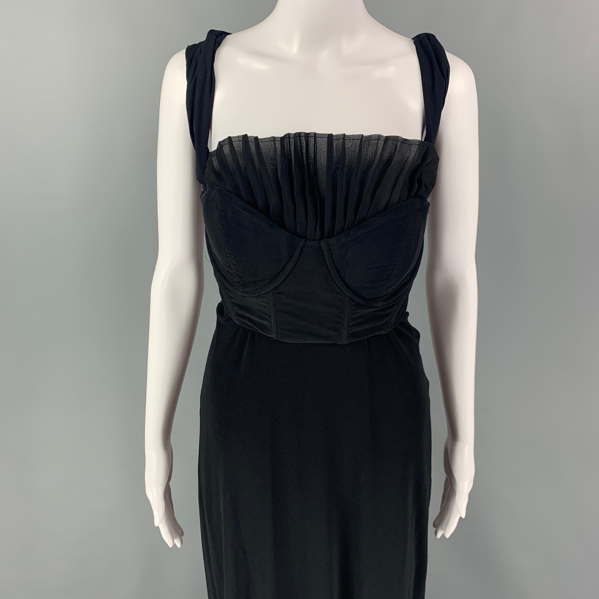 GIAMBATTISTA VALLI dress comes in a black silk featuring a sleeveless style, pleated panel, bustier detail, and a back zip up closure. Made in Italy. 

Very Good Pre-Owned Condition.
Marked: 46/L

Measurements:

Bust: 24 in.
Waist: 24 in.
Hip: 32