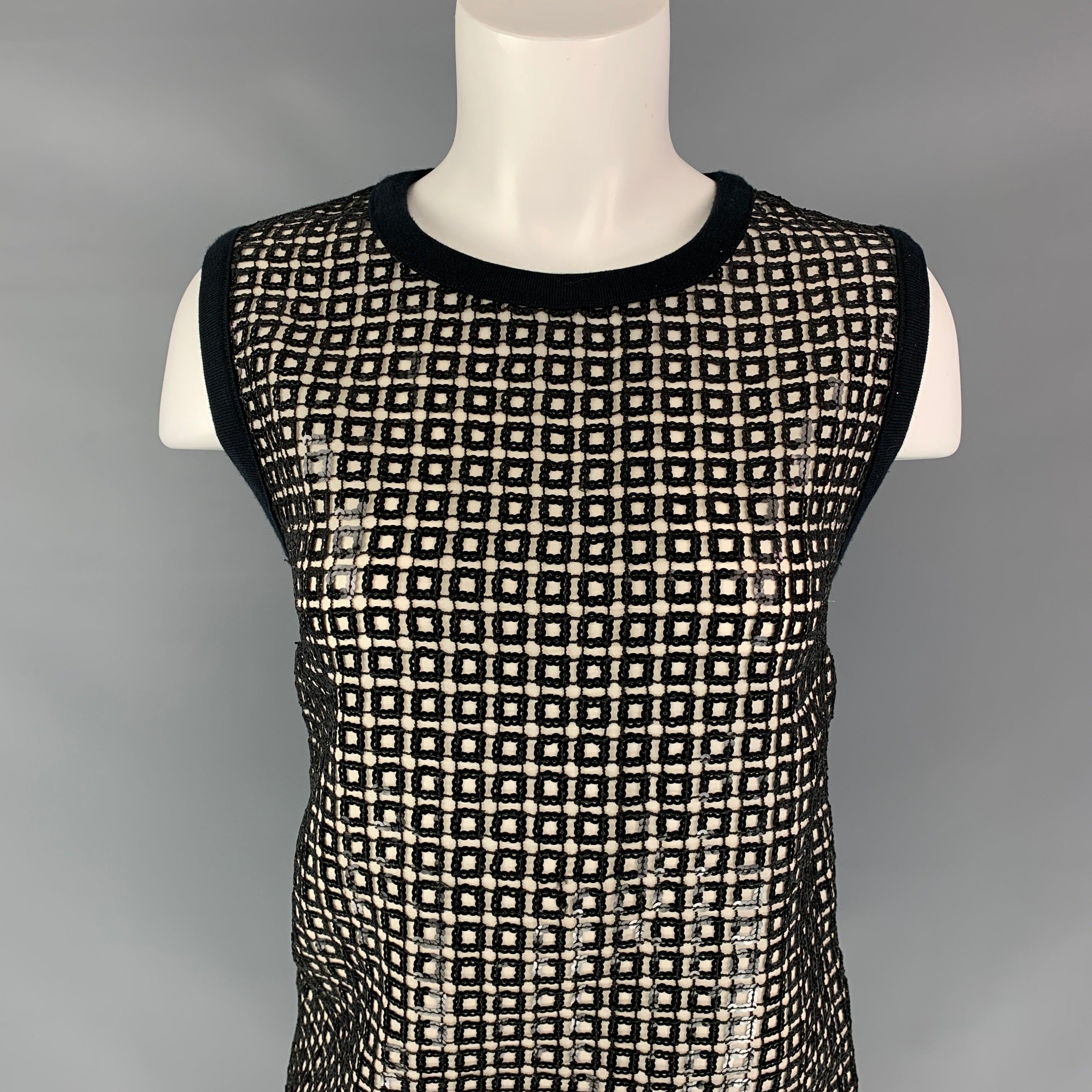 GIAMBATTISTA VALLI dress top comes in a black polyester with a cotton back featuring sequined details, sleeveless, and a crew-neck.
Very Good
Pre-Owned Condition. 

Marked:   42/S 

Measurements: 
 
Shoulder: 15 inches  Bust: 36 inches  Length: 20