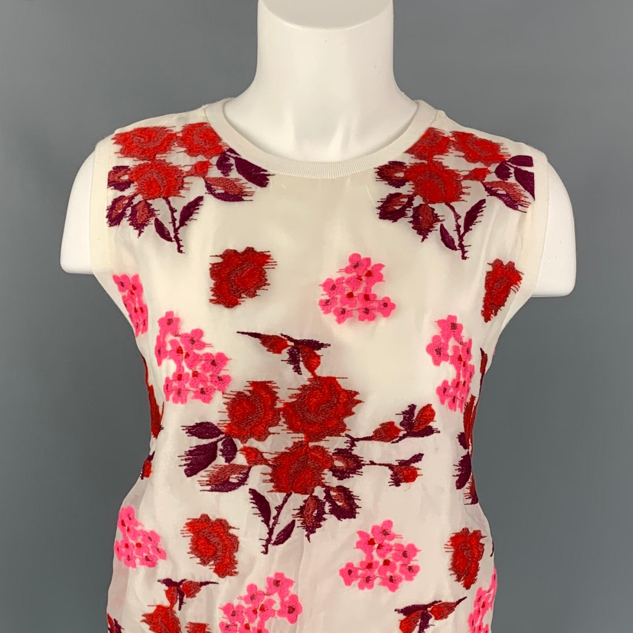 GIAMBATTISTA VALLI dress top coms in a white & burgundy floral cotton / silk featuring a sleeveless style, ribbed hem, and a crew-neck. Made in Italy.
Very Good
Pre-Owned Condition. 

Marked:   42/S 

Measurements: 
 
Shoulder: 14.5 inches  Bust: 42