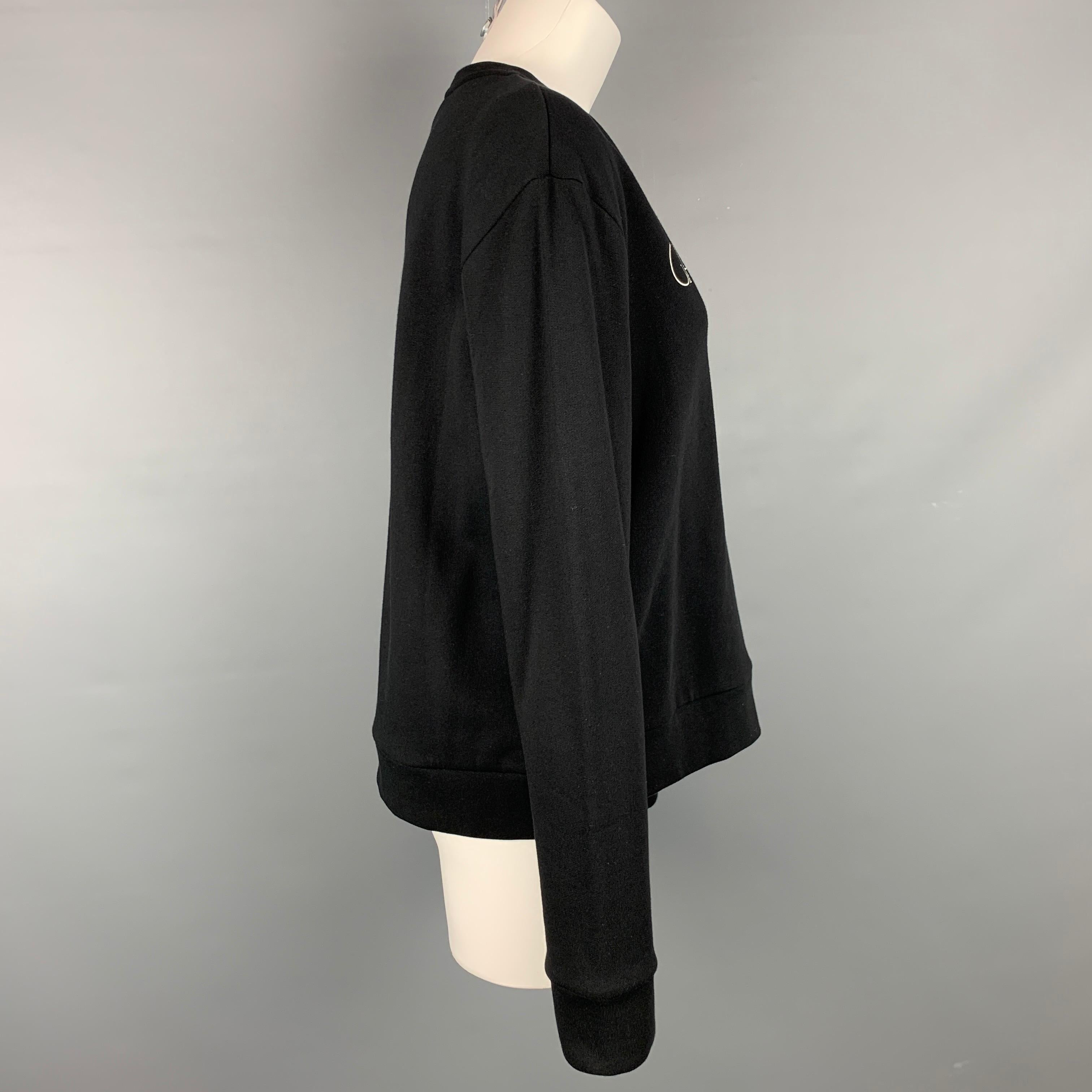 GIAMBATTISTA VALLI pullover comes in a black cotton with a white logo print detail featuring a crew-neck.

New With Tags. 
Marked: 46/XL
Original Retail Price: $643.00

Measurements:

Shoulder: 20 in.
Bust: 48 in.
Sleeve: 26 in.
Length: 24 in. 