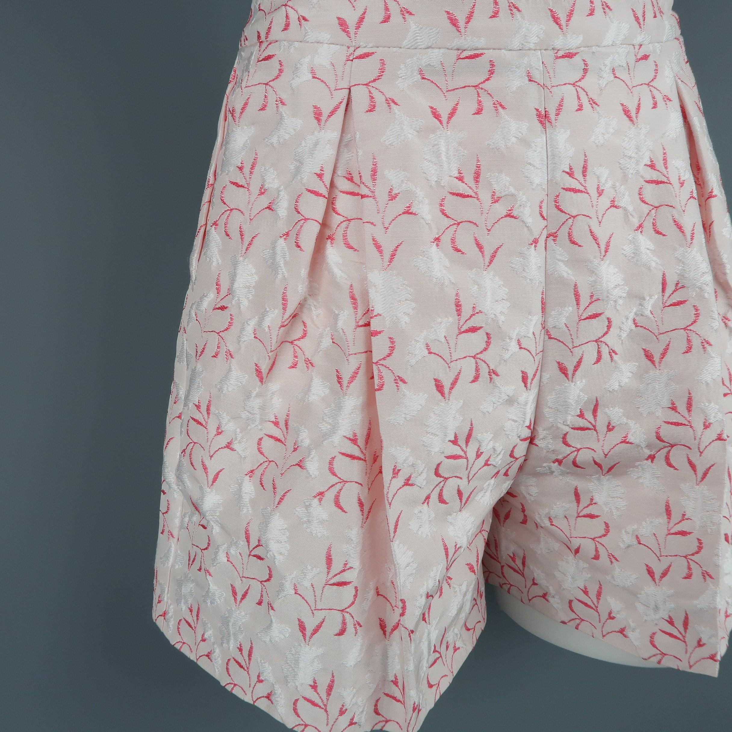 GIAMBATTISTA VALLI shorts come in a light pink silk blend floral damask fabric with a high rise, side pockets, and pleated front. Made in Italy.
Excellent Pre-Owned Condition.
 

Marked:   40/XS
 

Measurements: 
  
l	Waist: 25 inches 
l	Hip: 38