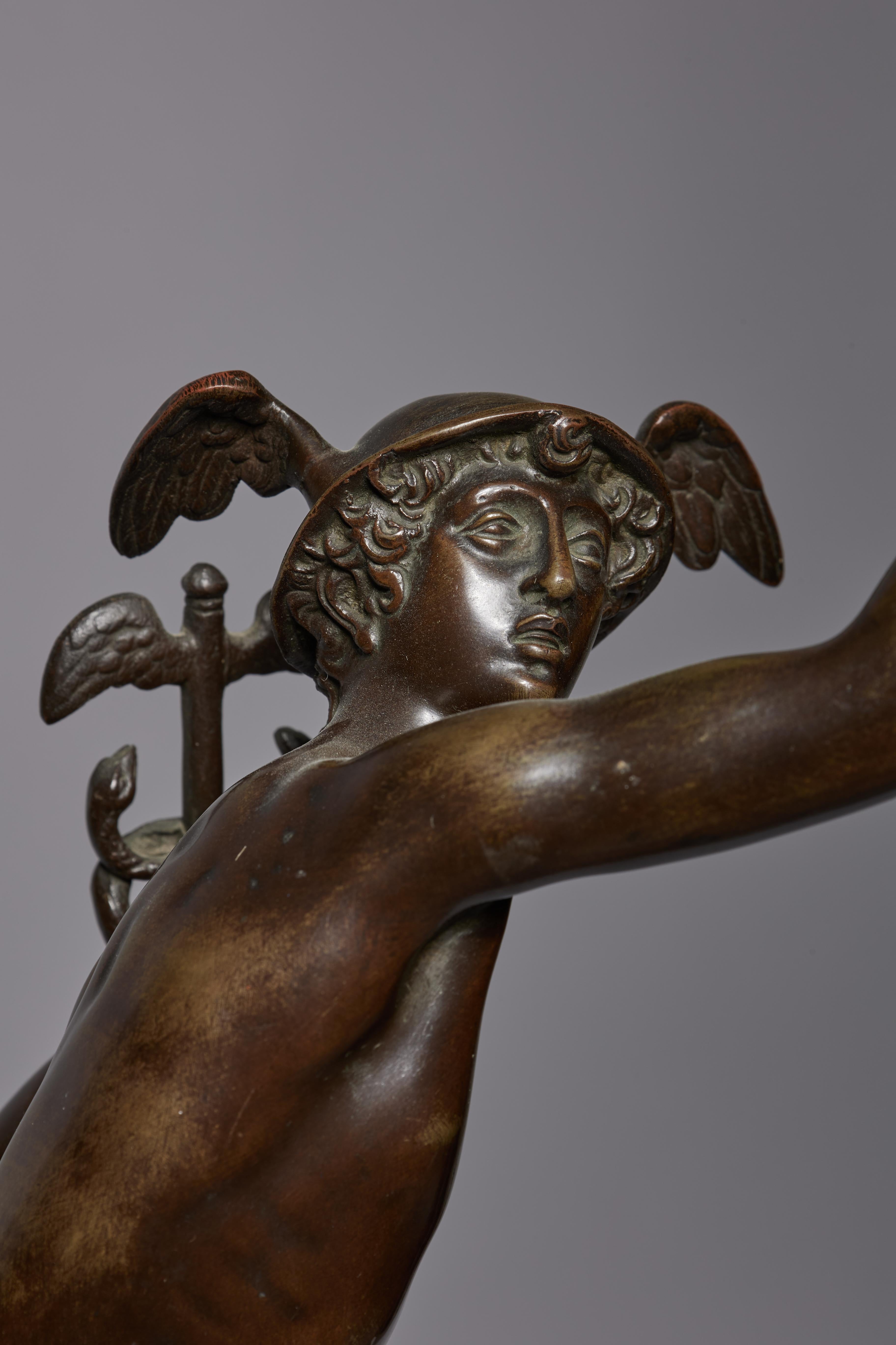 Mercury Standing on the Breath of Zeus, Antique Grand Tour - Gold Figurative Sculpture by Giambologna