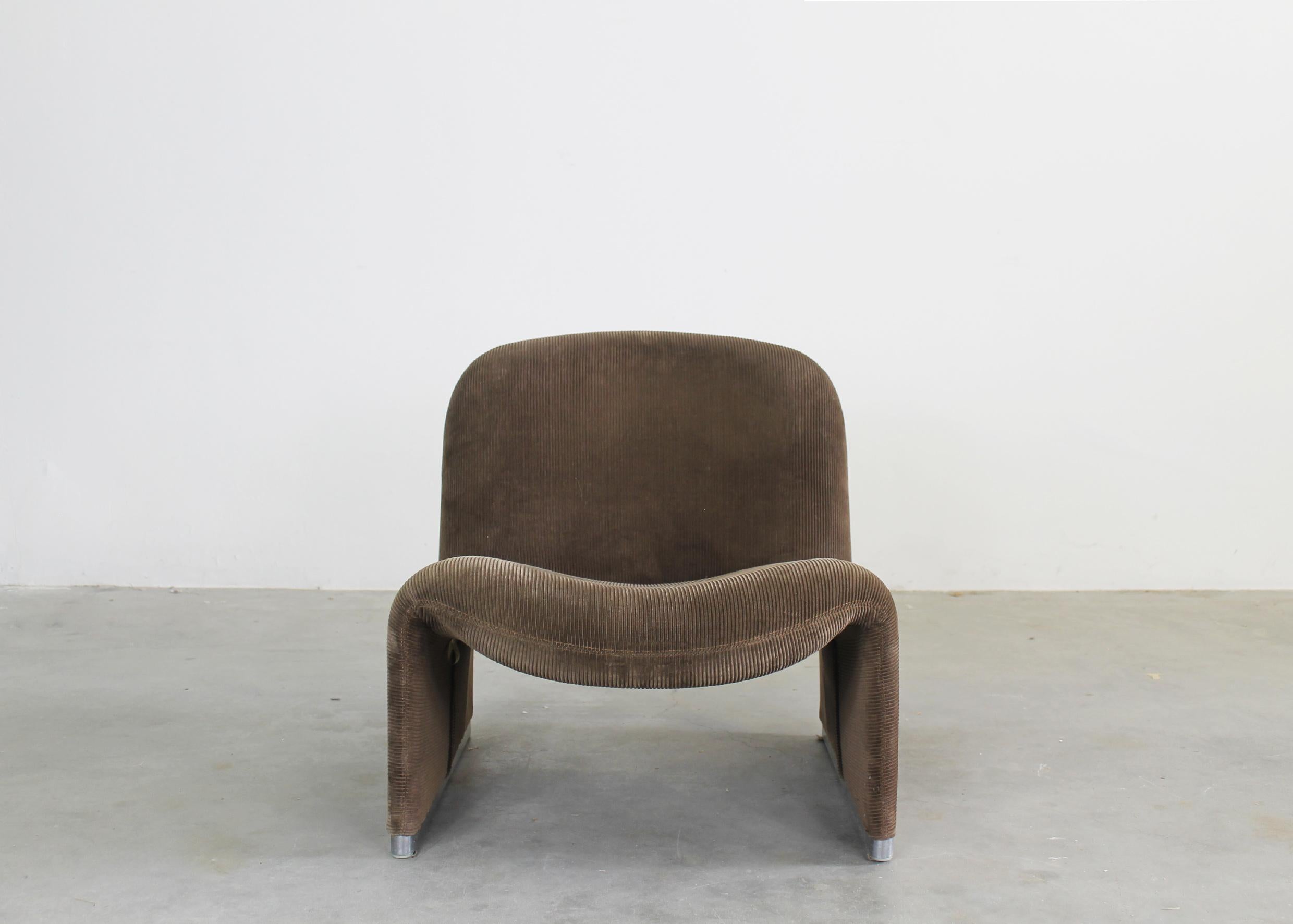 Alky chair with a structure in aluminum covered with dark brown velvet and chromed metal feet.
Designed by Giancarlo Piretti in the 1970s for Anonima Castelli. 
The manufacturer's label is present under the seat.

The Alky chair was designed to be