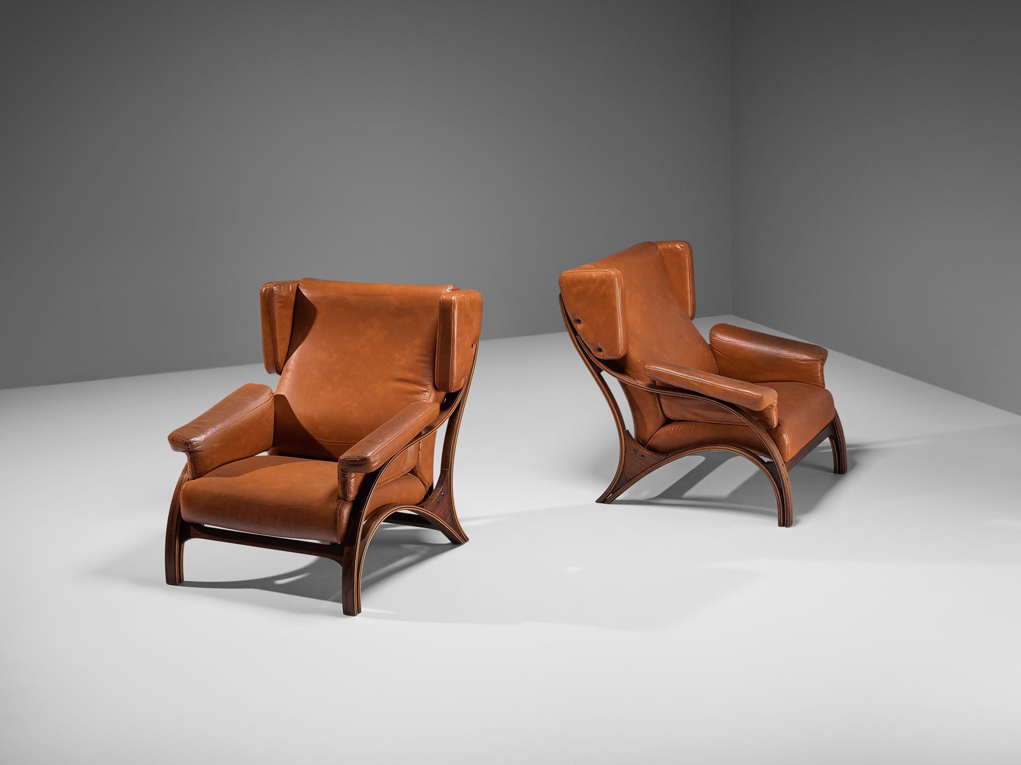 Giampiero Vitelli for Rossi di Albizzate, pair of 'Minore' lounge chairs, leather, plywood, Italy, 1961

A truly magnificent piece that scores highly on every design aspect: execution, material use, craftsmanship, and detail. This pair of 'Minore'