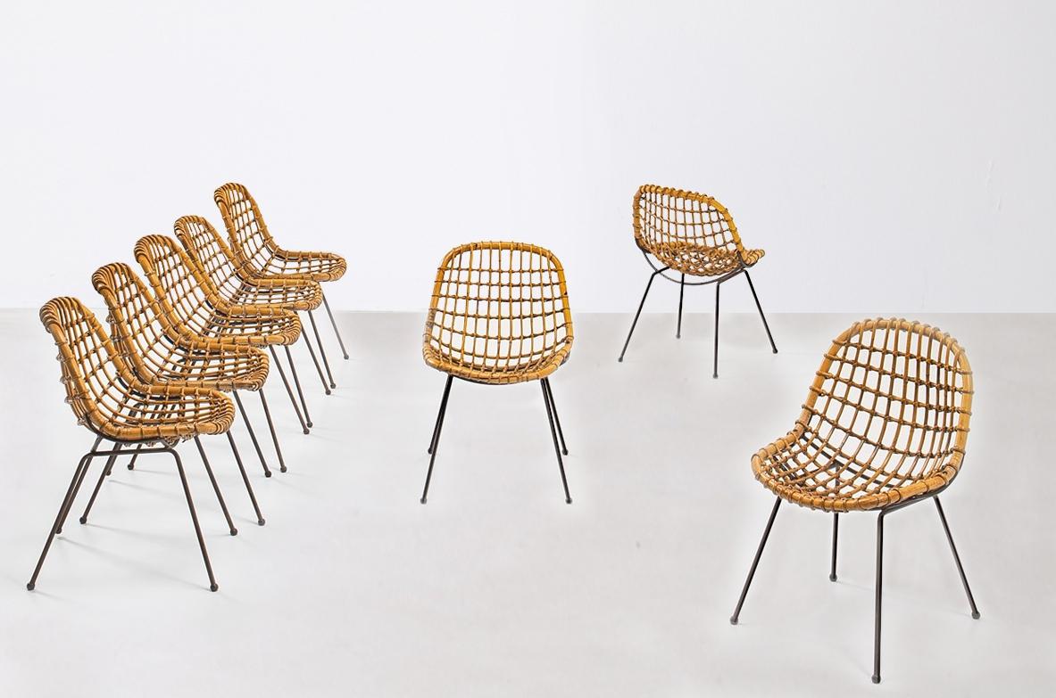 Gian Franco Legler

Splendid set of 8 curved rattan chairs with iron rod structure.

Italian manufacture, 1960s.

.