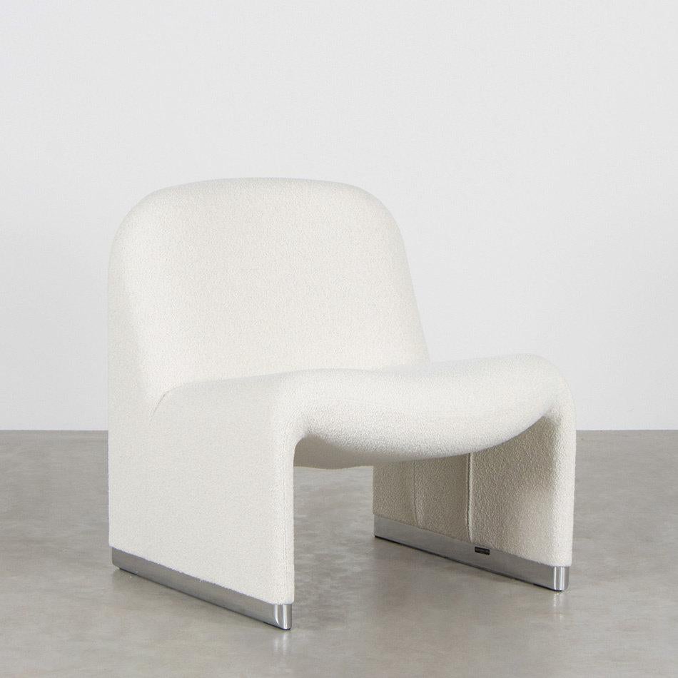 Iconic pair of Alky lounge chairs designed by Giancarlo Piretti in the sixties for Anonima Castelli, Italy. The shape of the chair is construct with foam printed direct on a metal frame with elastic bands, to ensure comfort and stability. The chair