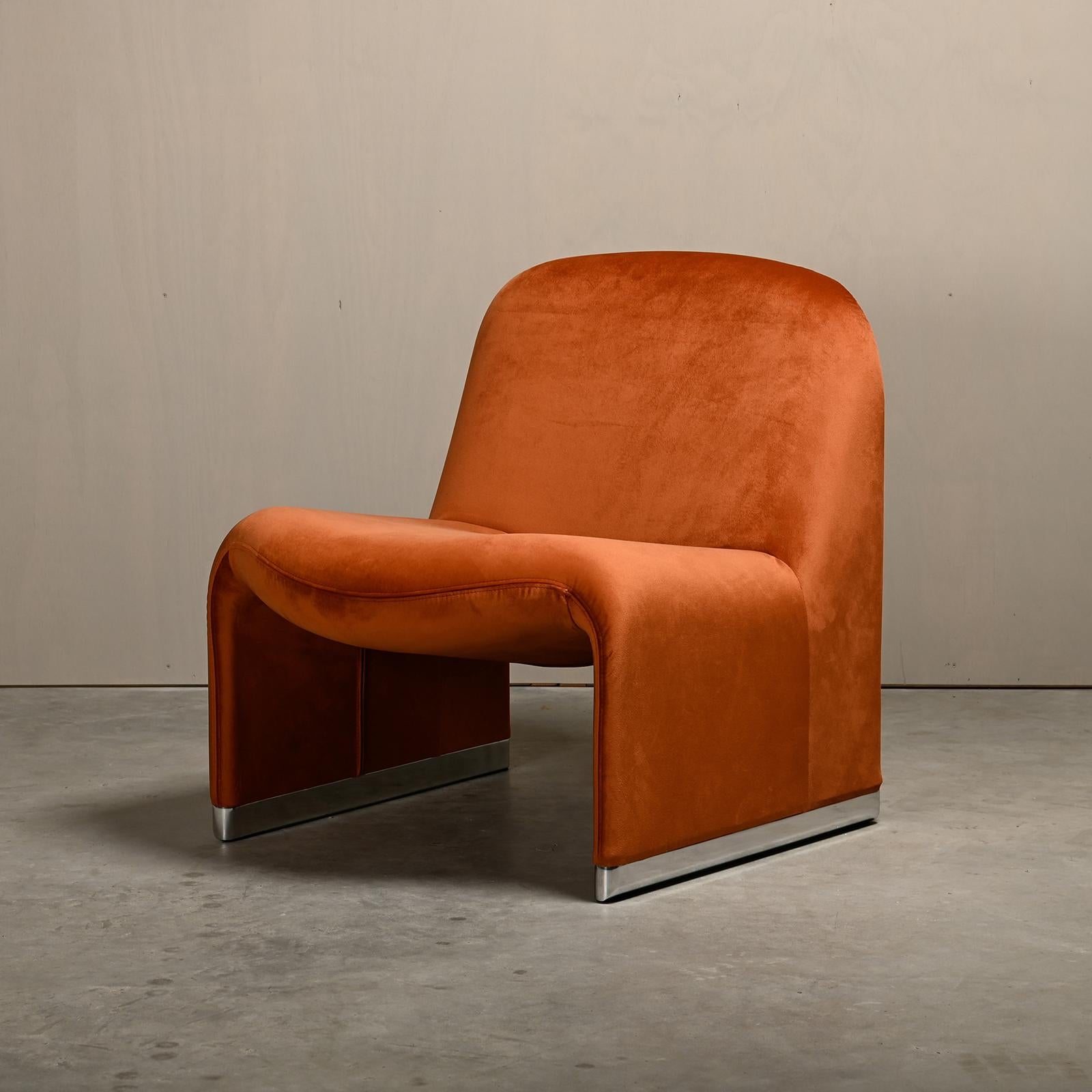 Iconic pair Alky lounge chairs designed by Giancarlo Piretti in the sixties for Anonima Castelli, Italy. The shape of the chair is construct with foam printed direct on a metal frame with elastic bands, to ensure comfort and stability. The chair is
