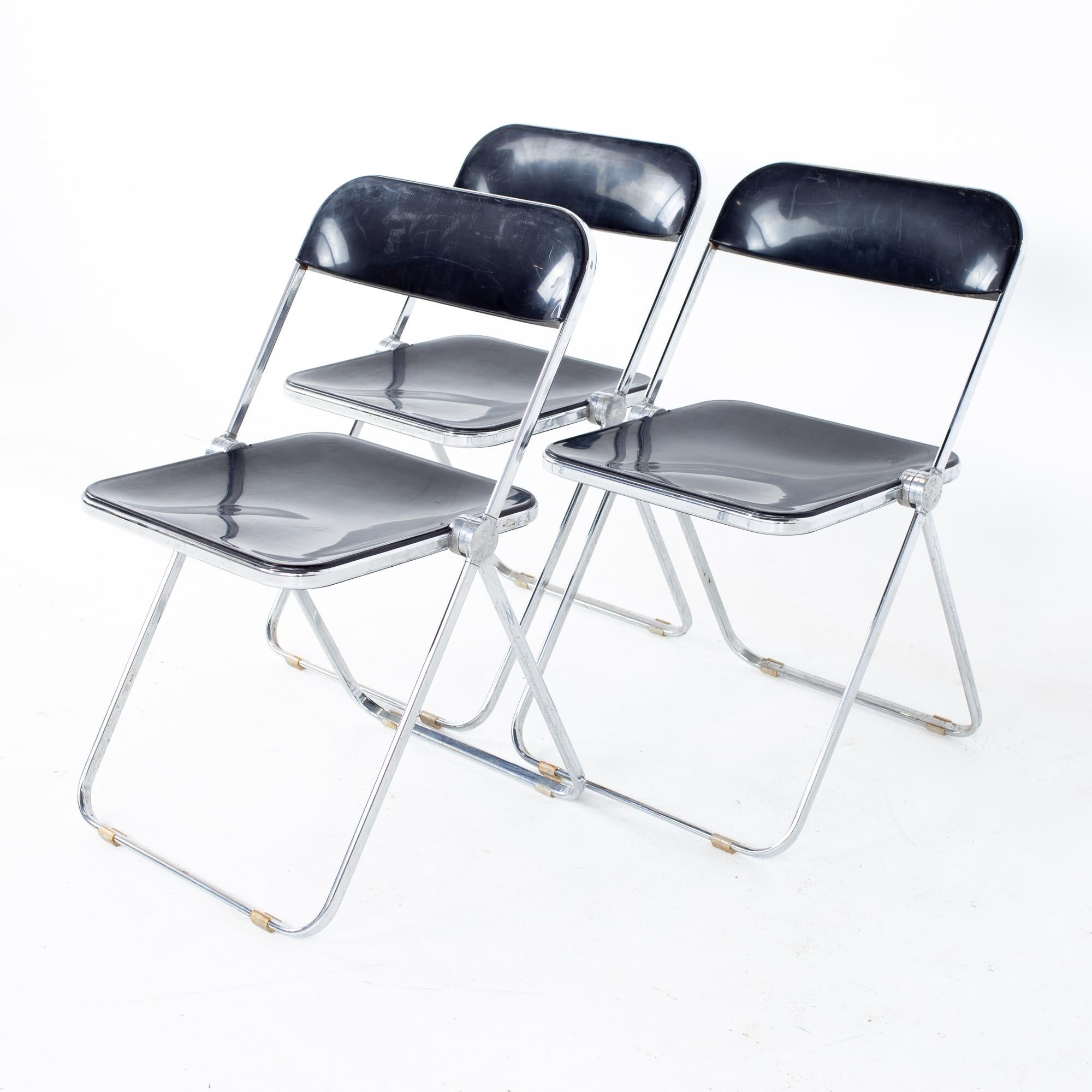 Giancarlo Piretti Anonima Castelli style mid century smoked Lucite folding chairs - Set of 3
Each chair measures: 18.5 wide x 19.25 deep x 29.5 high, with a seat height of 17.5 inches

All pieces of furniture can be had in what we call restored