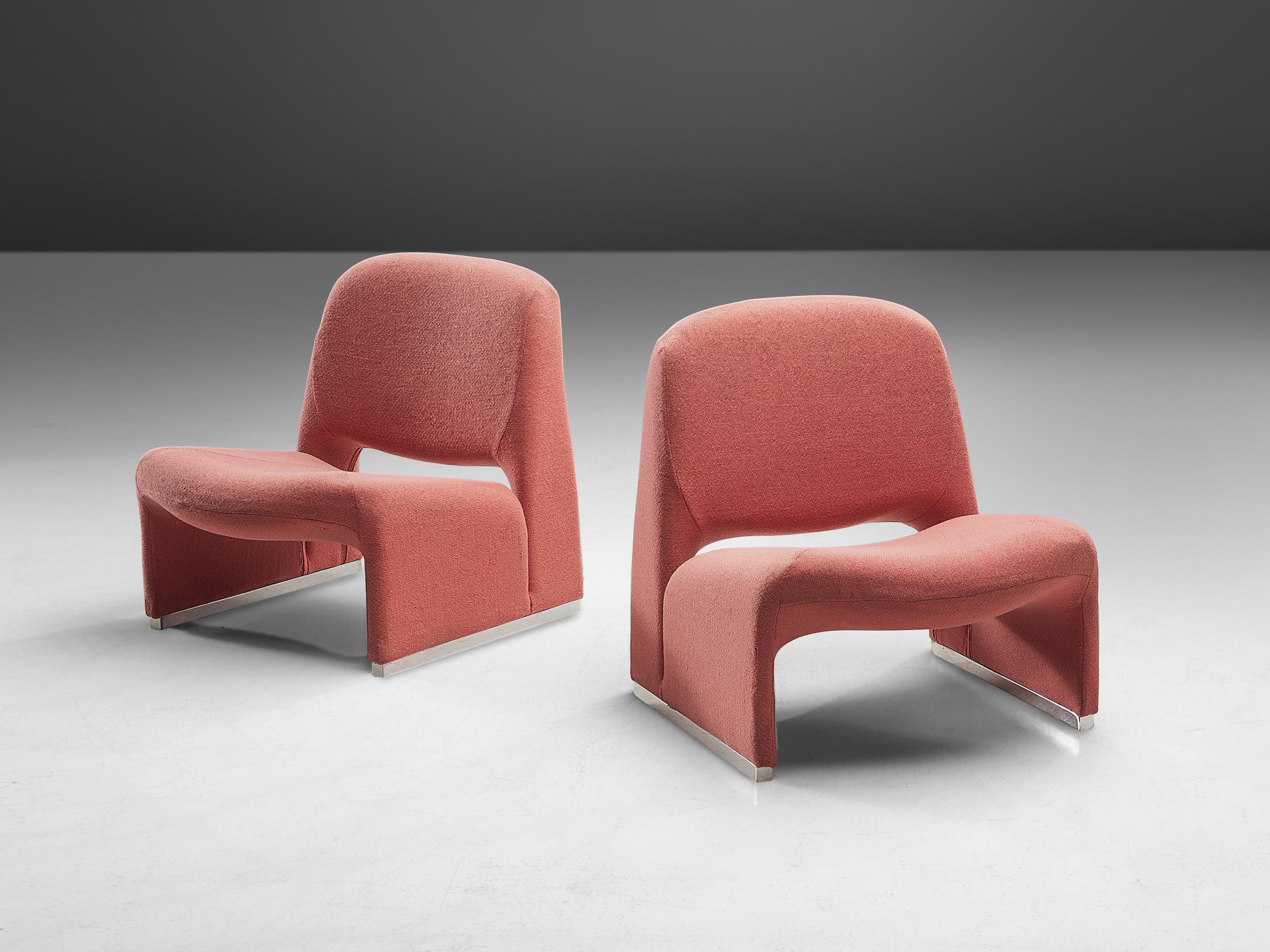 Lounge chairs, fabric, metal, Italy, 1970s

These lounge chairs strongly remind of Giancarlo Piretti’s ‘Alky’ lounge chair (1969), yet they feature characteristic differences. Whereas the ‘Alky’ lounge chair consists of one shell, these chairs have