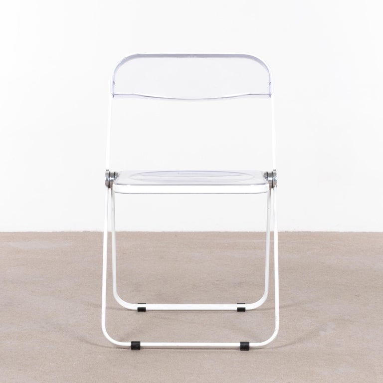 Practical and probably the best designed folding chair to date by Giancarlo Piretti for Castelli, Italy, 1967. White coated steel frame with polypropylene panels in good vintage condition.
