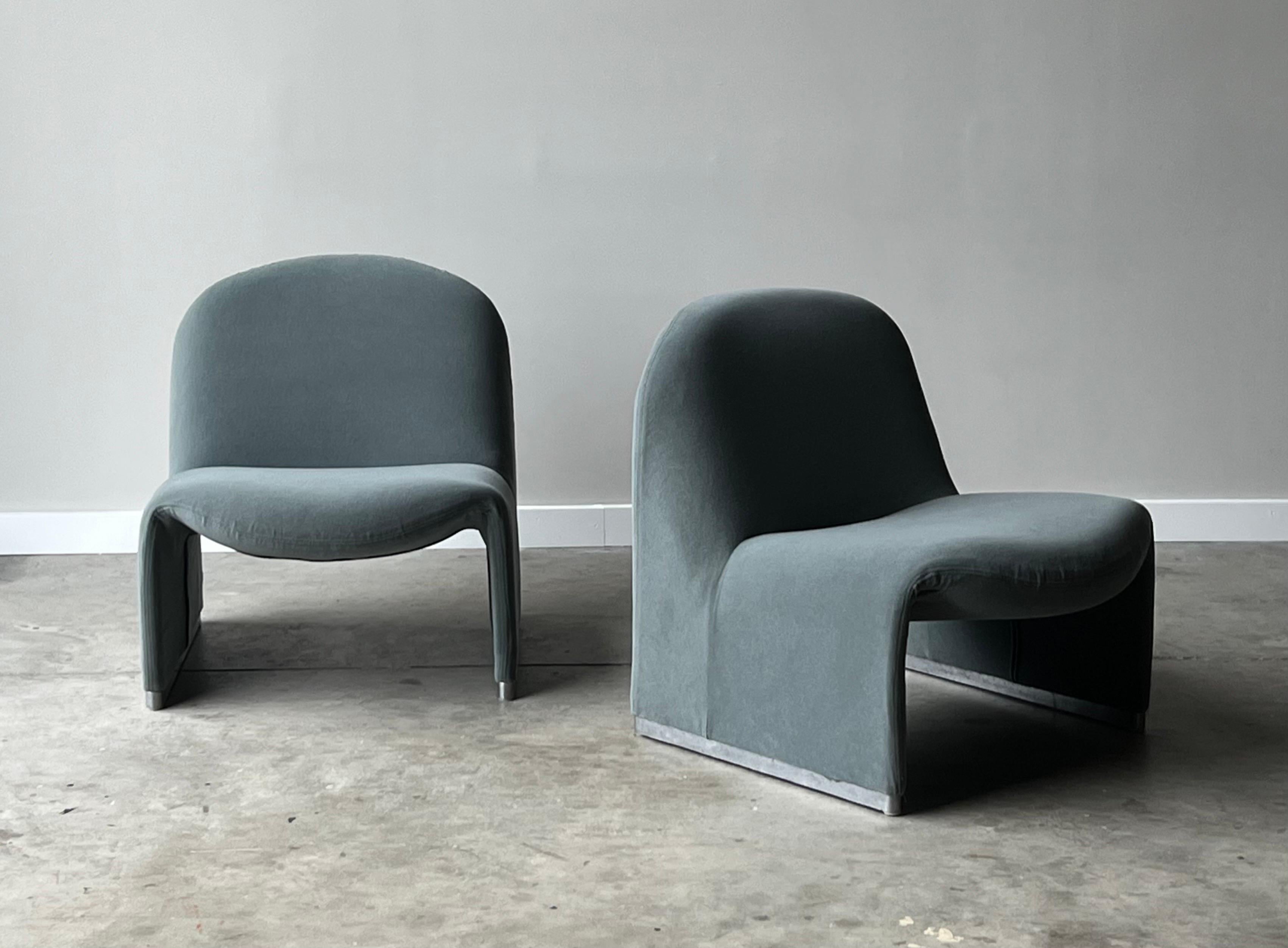 A beautiful pair of iconic 'Alky' lounges designed by Giancarlo Piretti for Anonima Castelli. Produced in the late 1970s, Italy. Iconic Italian design and so damn comfy. Newly reupholstered in a soft light dusty sea foam mohair fabric. In great